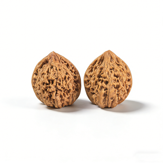 Walnut hand exerciser from ThePatinaProject, featuring the High-Tower Official’s Hat design with symmetrical build and collector’s pair.