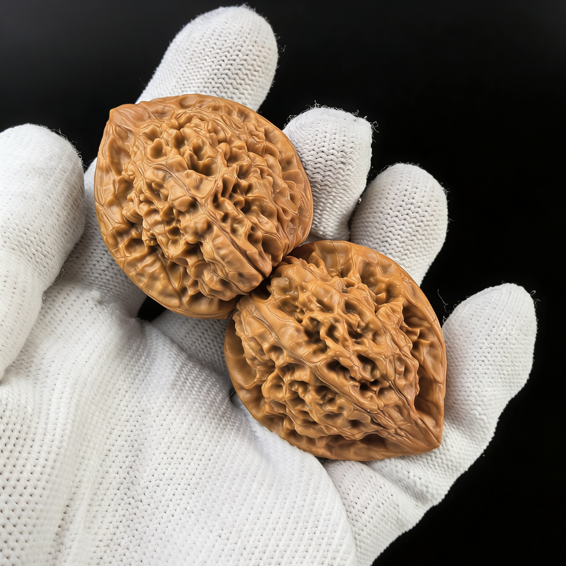 Pair of walnut hand exercisers from ThePatinaProject, featuring the High-Tower Official’s Hat design with symmetrical build and rare proportions.