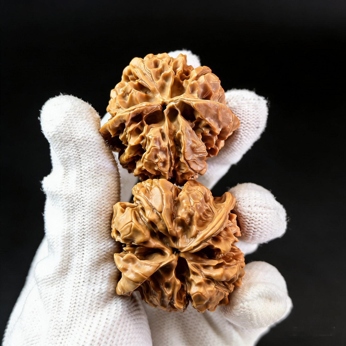 Walnut hand exercisers from ThePatinaProject, featuring classic high-pile ridges and broad base, designed for grip strength training.