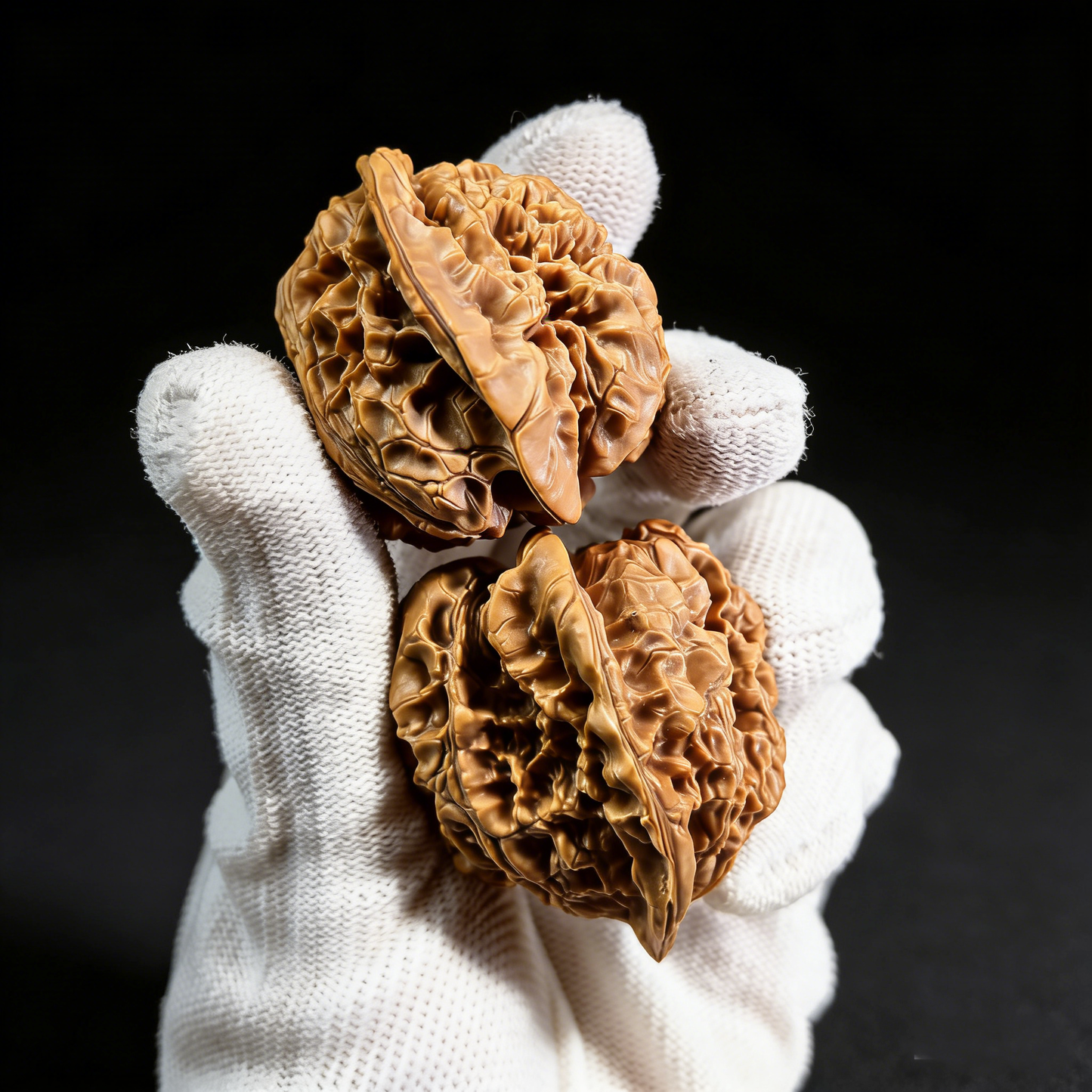 Walnut hand exercisers with high-pile ridges and broad base, branded ThePatinaProject, 41mm collector’s pair for grip strengthening.