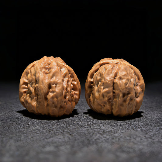Pair of Jade Toad Crystal Frog walnut hand exercisers from ThePatinaProject, featuring detailed carved toad and frog designs.