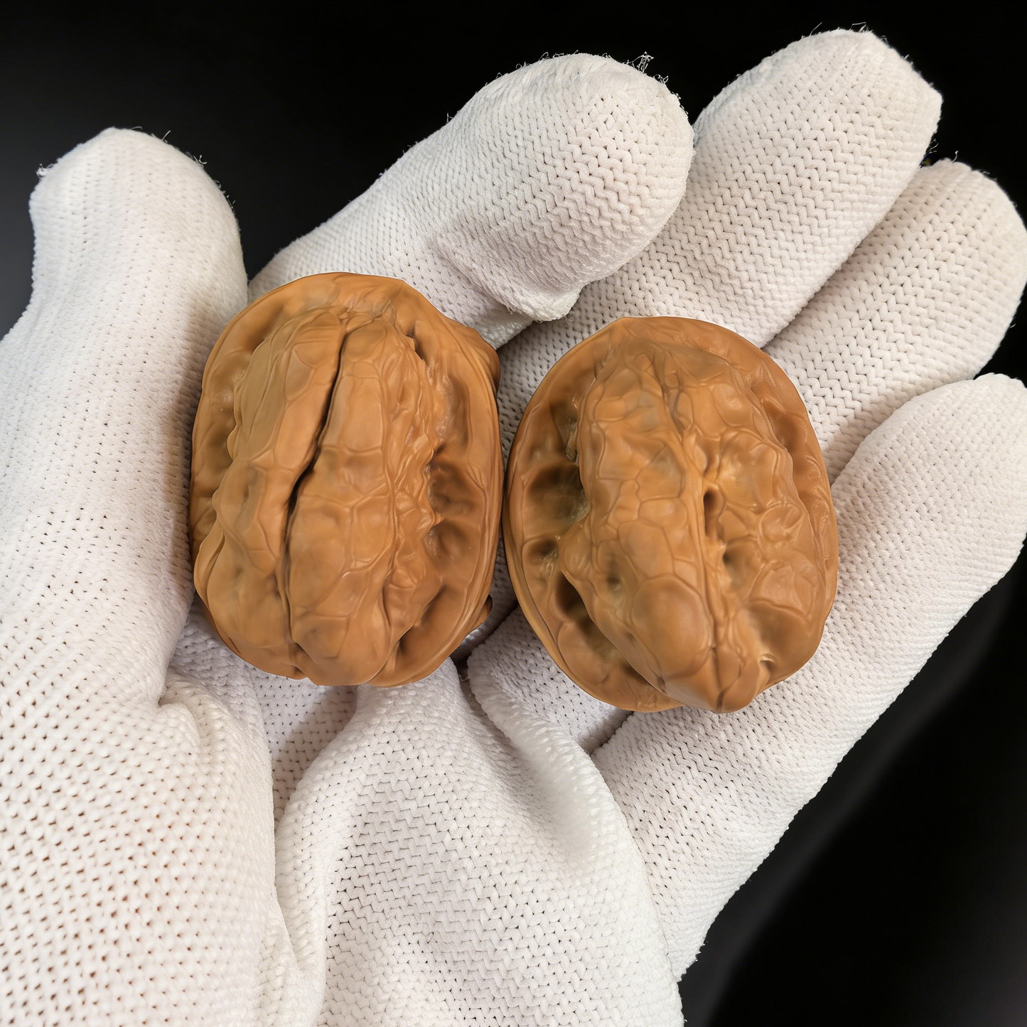 Walnut hand exercisers featuring the Jade Toad - One-Day Red design from ThePatinaProject, 28mm collector’s pair for beginners.