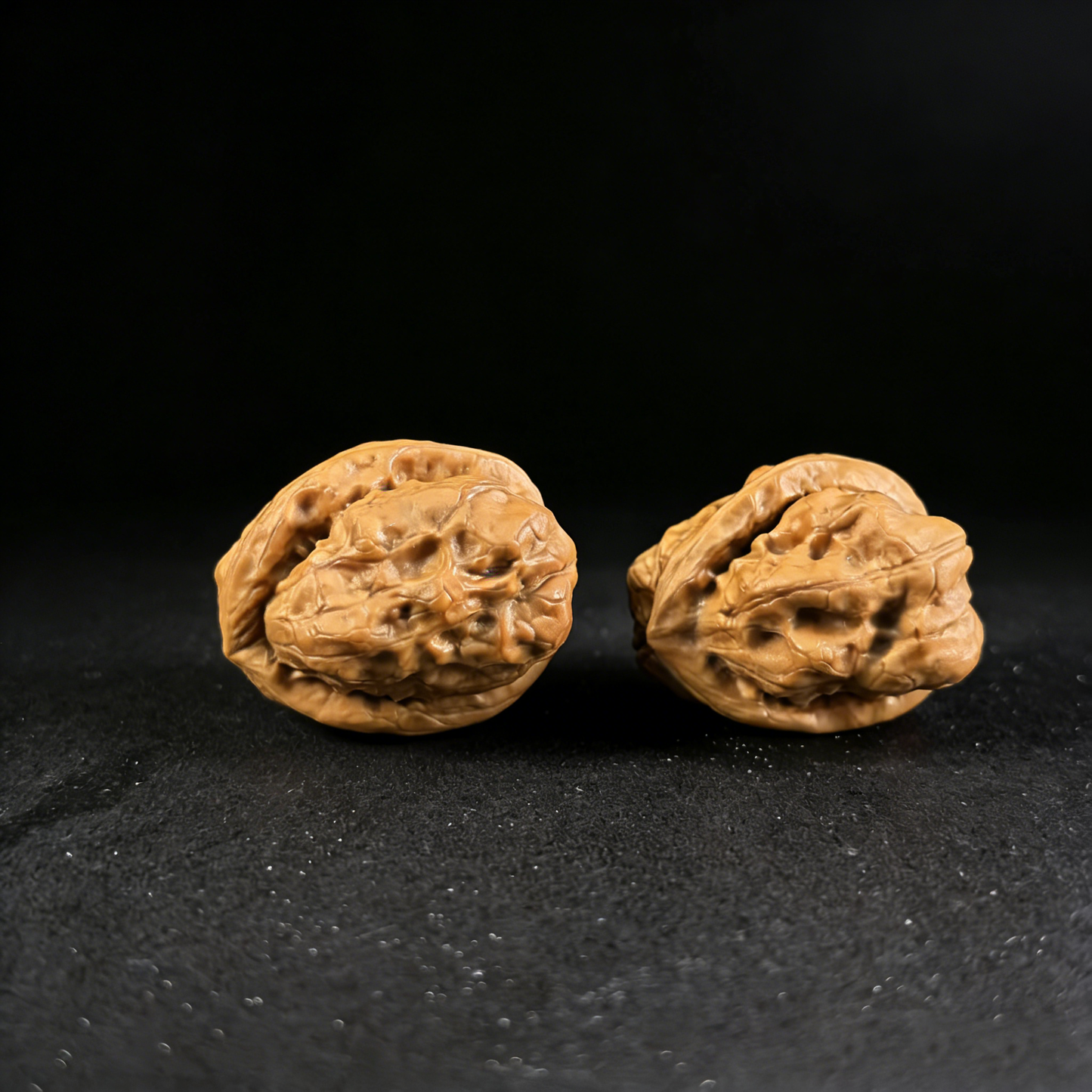 Walnut hand exerciser featuring the Jade Toad (Yu Chan) design from ThePatinaProject, 28mm fingertip pair for grip strength training.