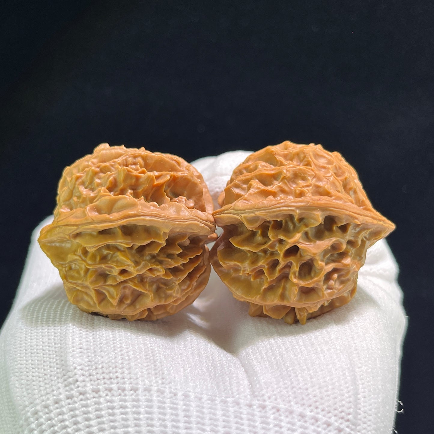 Pair of Walnut Hand Exercisers called Lantern (Deng Long) by ThePatinaProject, 39mm x 38mm, showing smooth polished wood surfaces.