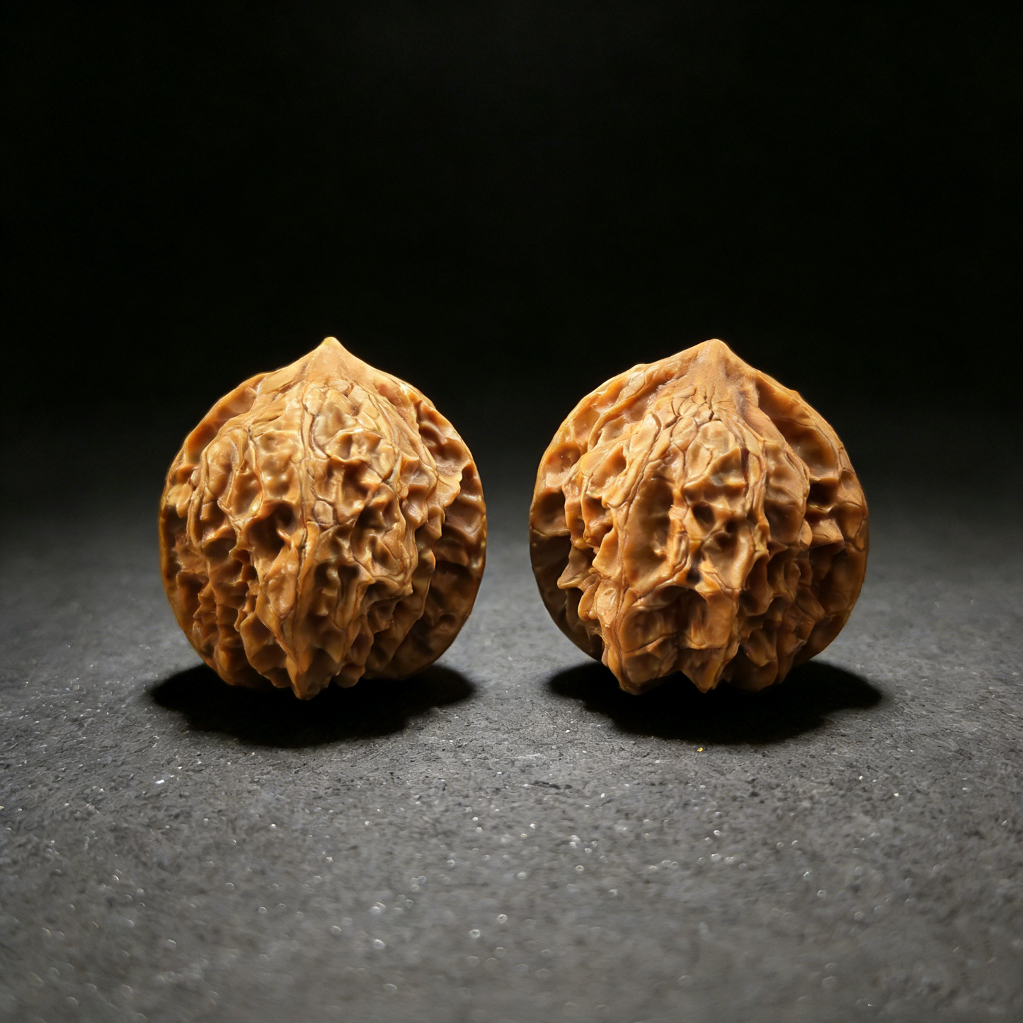 Walnut hand exerciser featuring miniature heart designs, 33mm size from ThePatinaProject's Ling Long Miniature Hearts collection.
