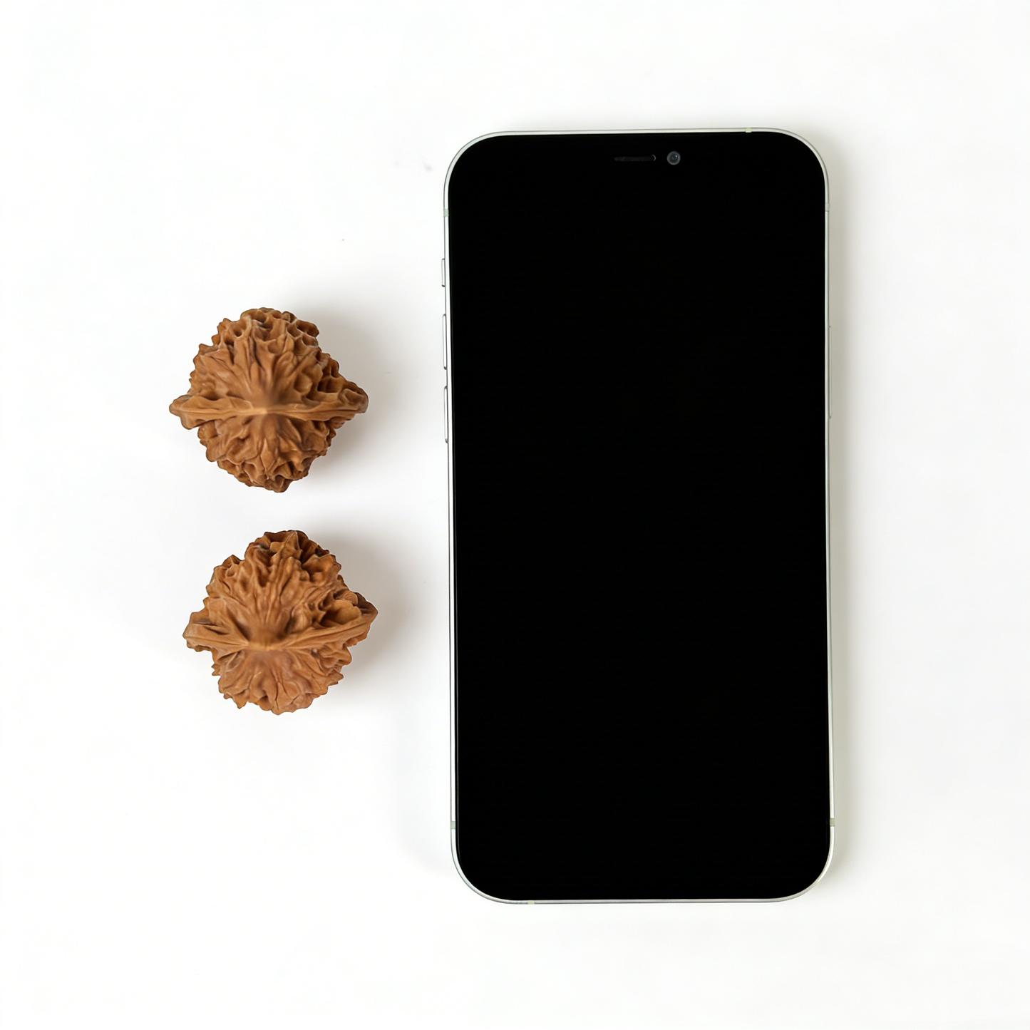 Pair of white walnut hand exercisers from ThePatinaProject, 34mm Ling Long Walnut Hand Exercisers for grip strength training.