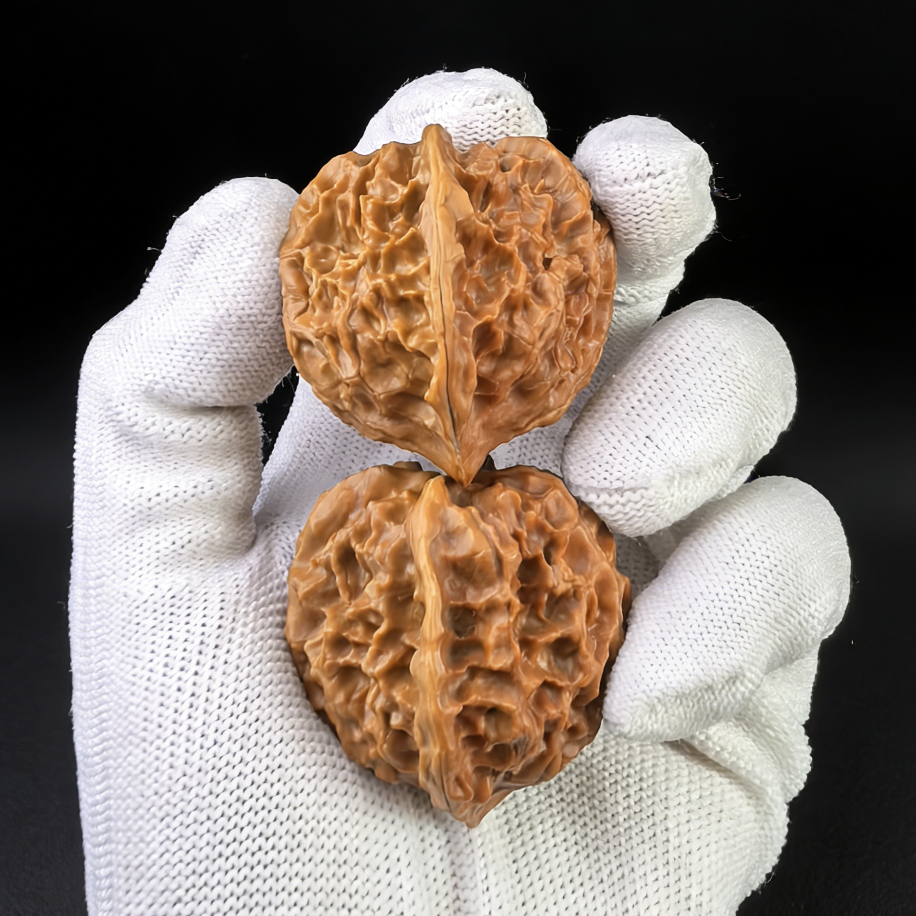 White Snake Valley Walnut Hand Exerciser pair by ThePatinaProject, 39mm, LN-02, showcasing smooth, natural wood grips for finger strength.