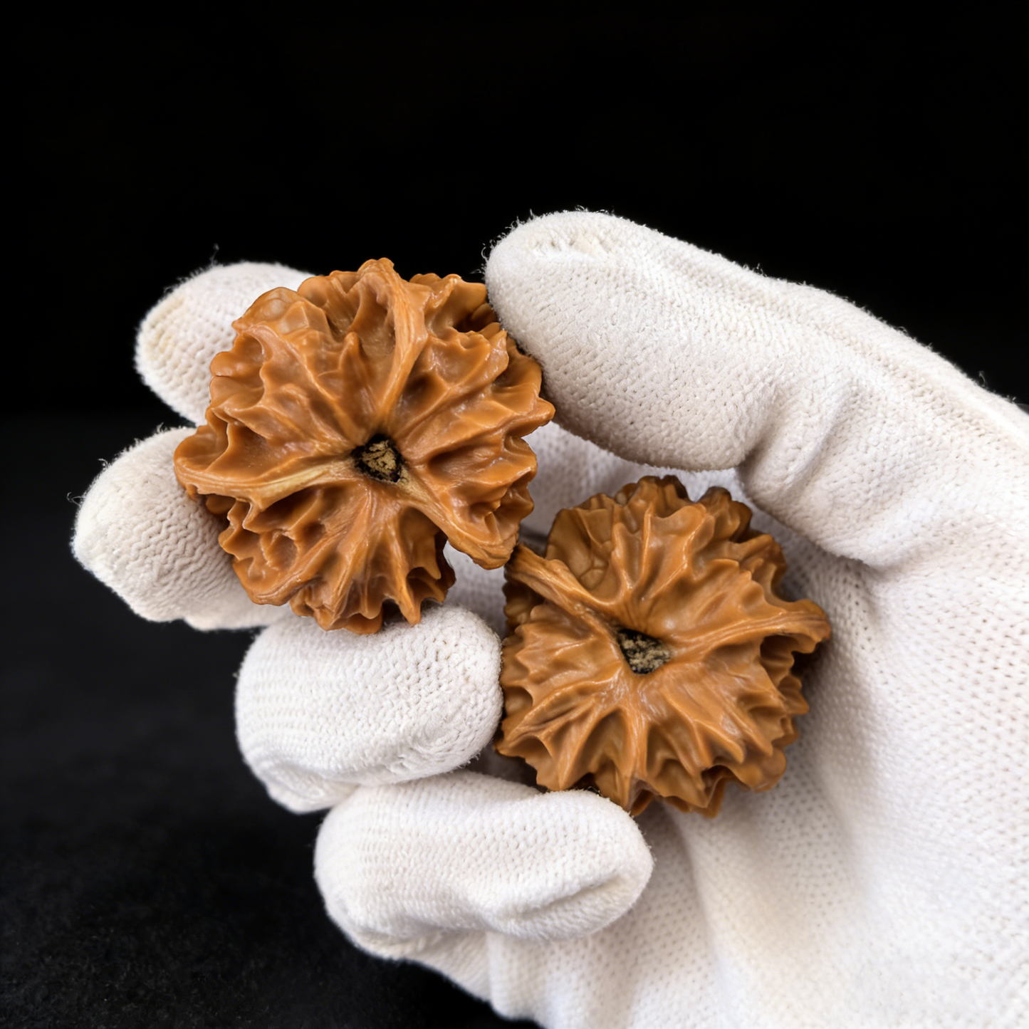 Pair of "Mercedes" Natural 3-Ridge Walnut Hand Exercisers by ThePatinaProject, showcasing smooth, polished walnut grips for hand strengthening.