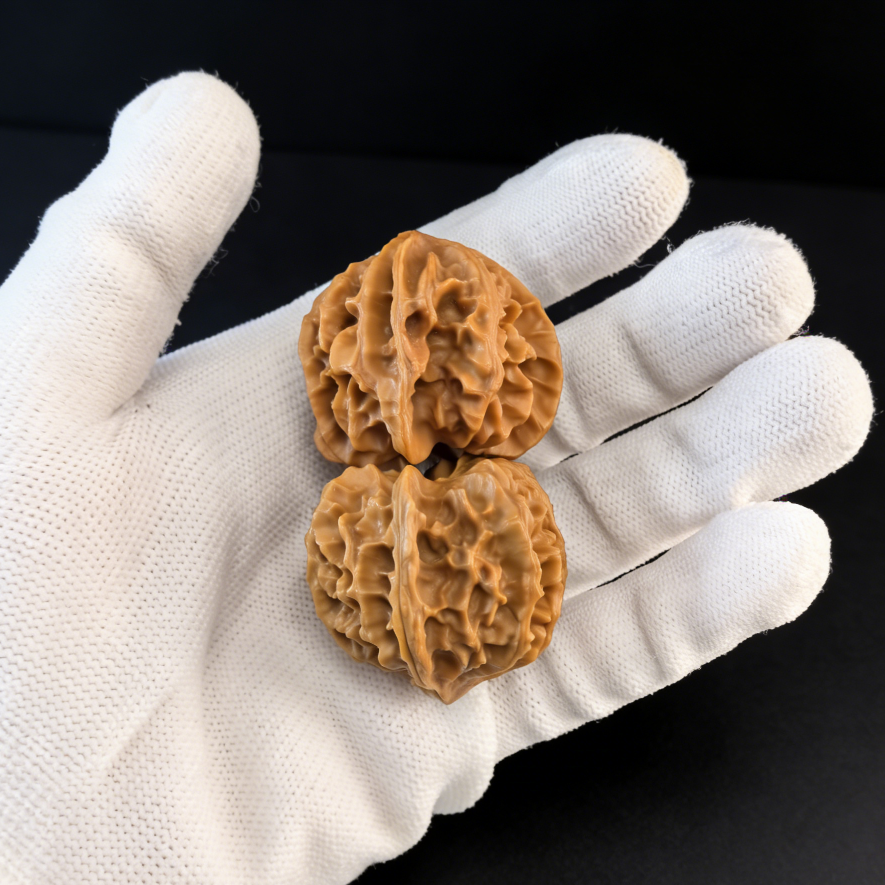 Mercedes Pair of Natural 3-Ridge Walnut Hand Exercisers by ThePatinaProject, showing textured walnut grip tools for hand strengthening.