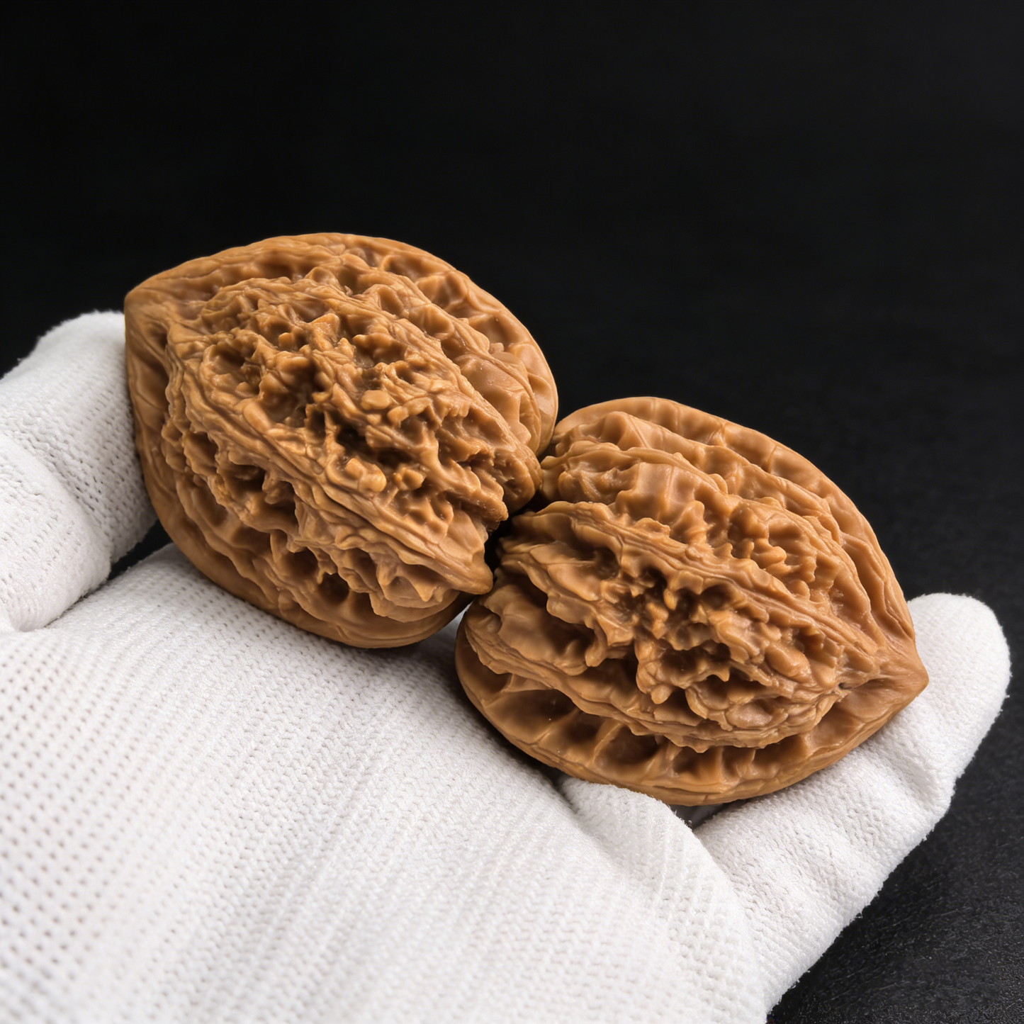 Pair of walnut hand exercisers named Meteor Shower (Liu Xing Yu) with 37mm deep ridges, by ThePatinaProject.
