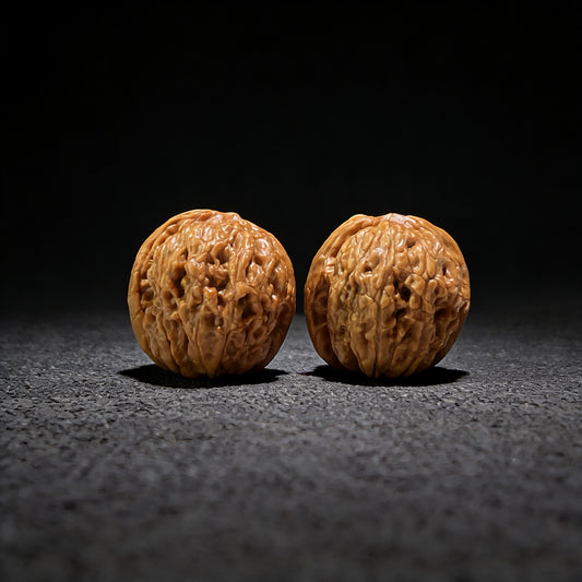 Mini pair of Walnut Hand Exercisers shaped like Meteorite Ingots, 31mm x 34mm, from ThePatinaProject YSYB-601 collection.