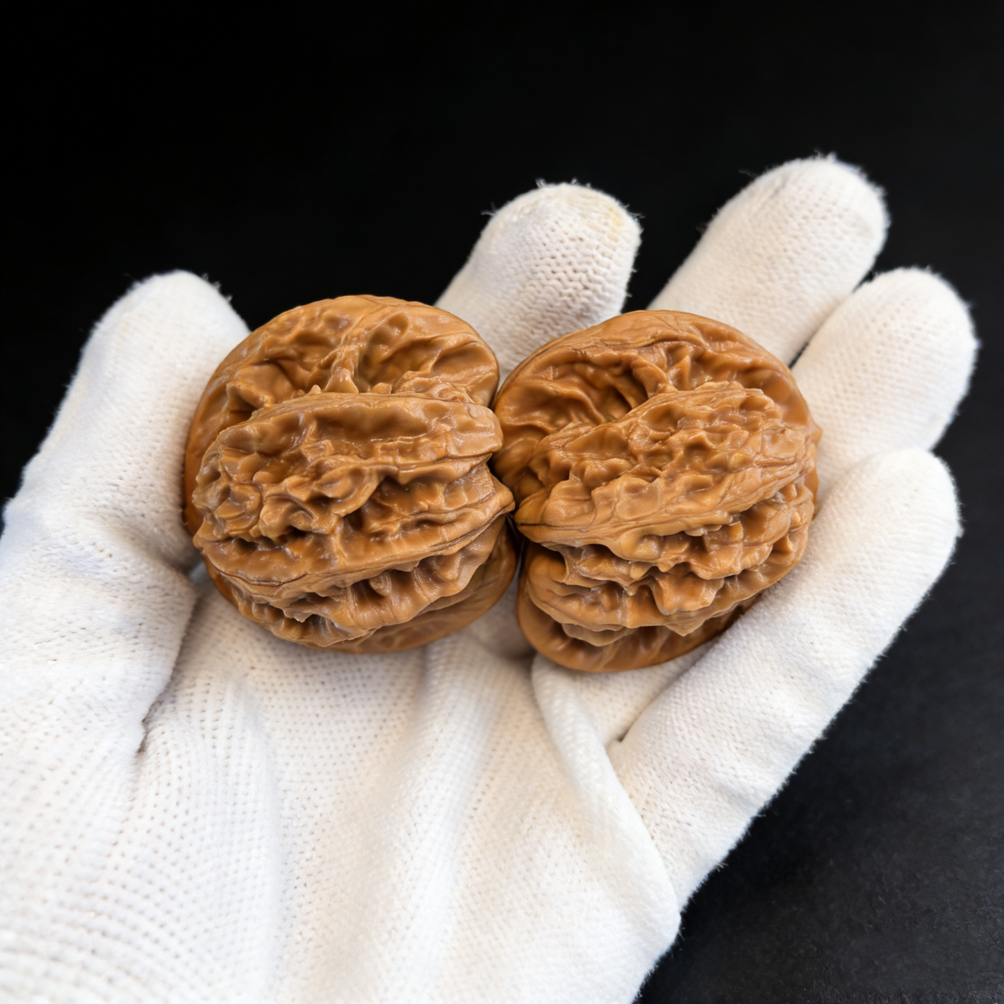 Walnut hand exerciser featuring Mist Cloud Ridge heritage lion head design, 41mm size, by ThePatinaProject.