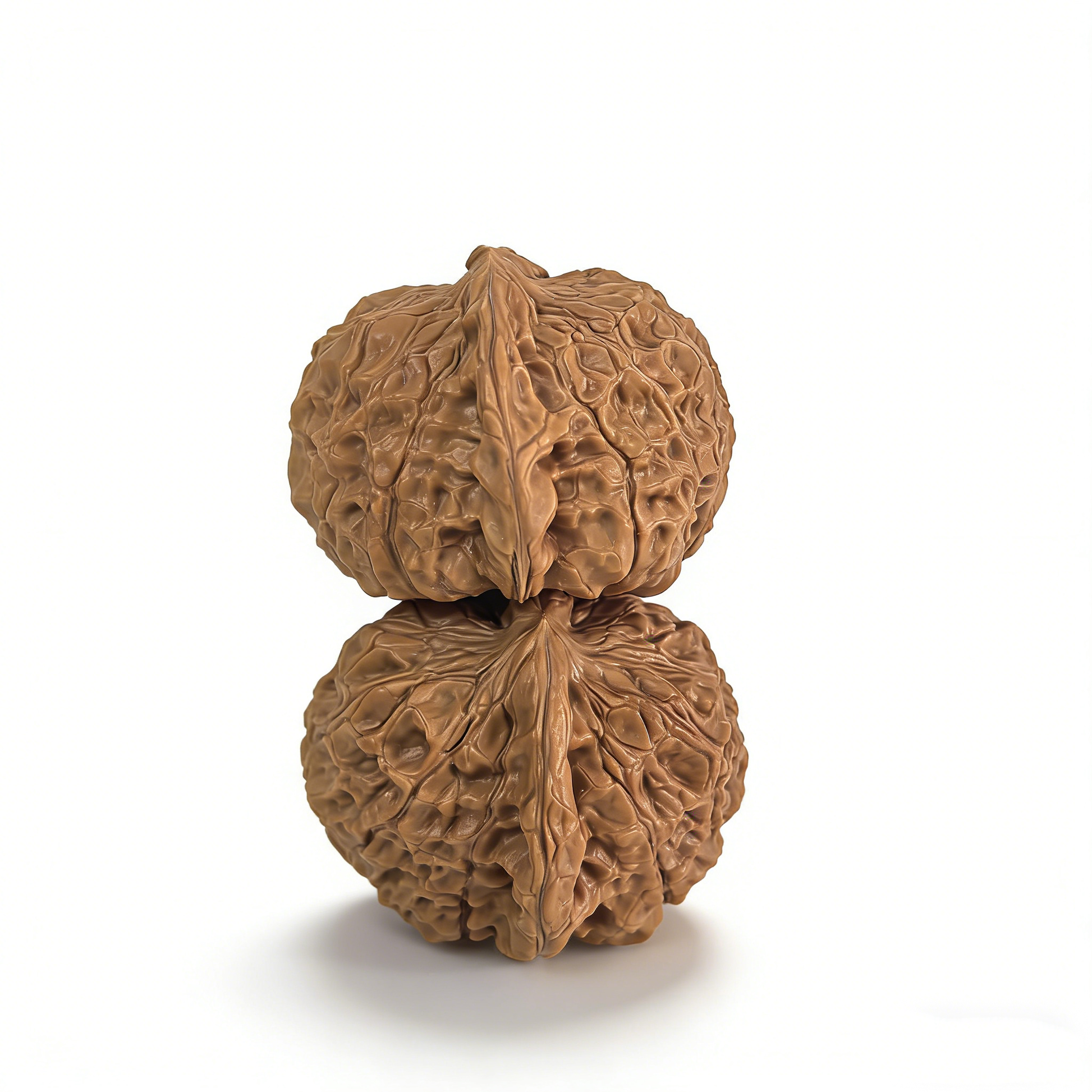 Pair of Nan Gua Dun pumpkin-shaped walnut hand exercisers, 40mm, from ThePatinaProject, showing textured wooden surface and natural finish.
