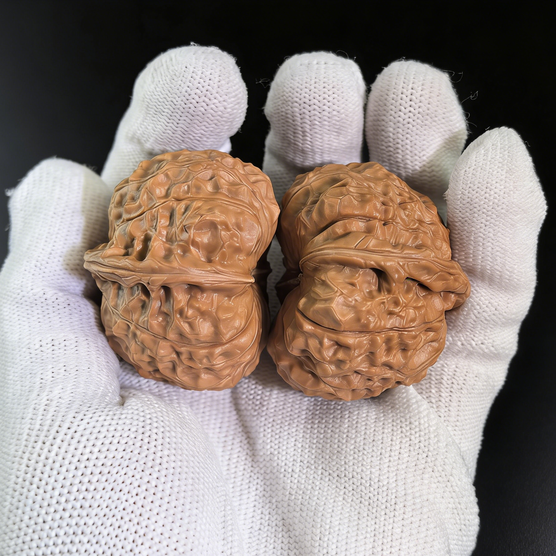 Walnut hand exerciser pair labeled "Nan Gua Dun" 40mm by ThePatinaProject, featuring natural wood grain and ergonomic design.
