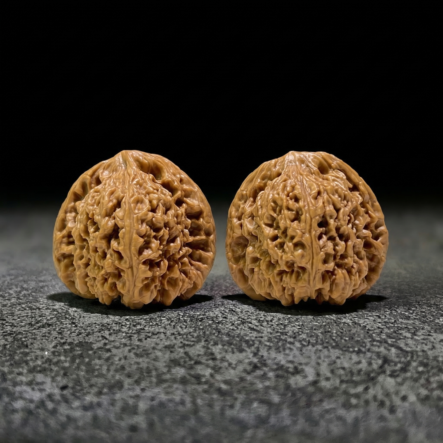 Walnut hand exercisers from ThePatinaProject, NJS-408, 40mm x 38mm, featuring textured walnut wood for grip and hand strengthening.