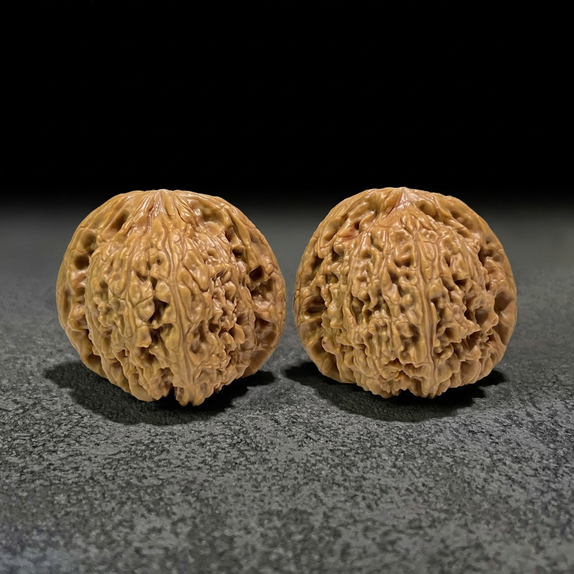 Walnut hand exerciser pair from ThePatinaProject, NJS-403, 41mm x 42mm, featuring textured walnut wood handles for grip and exercise.