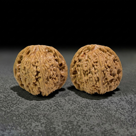 Walnut hand exerciser pair from ThePatinaProject, NJS-403, 41mm x 42mm, featuring textured walnut wood handles for grip and exercise.