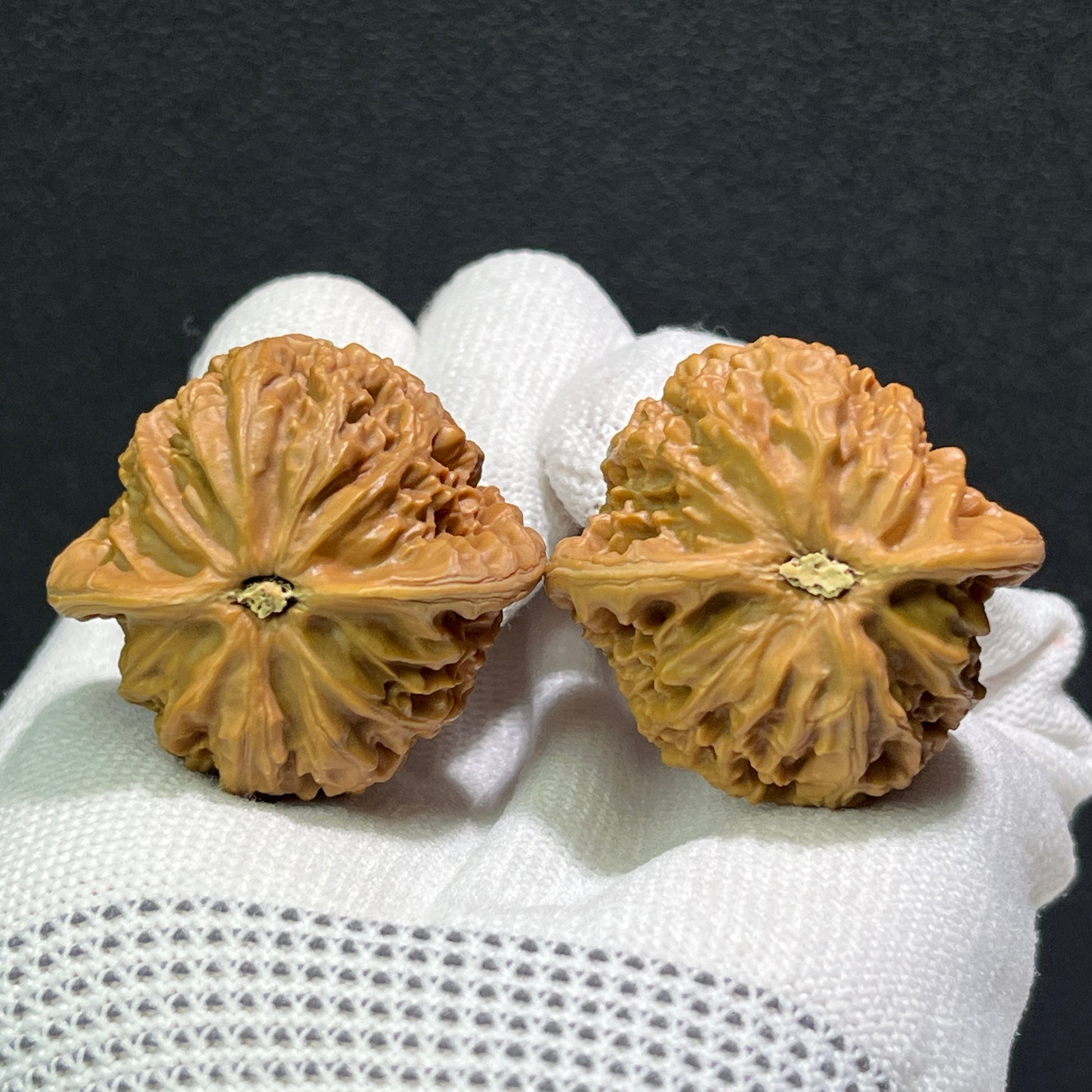 Pair of Walnut Hand Exercisers, Palace Lantern (Gong Deng) style, from ThePatinaProject, measuring 36mm x 34mm.