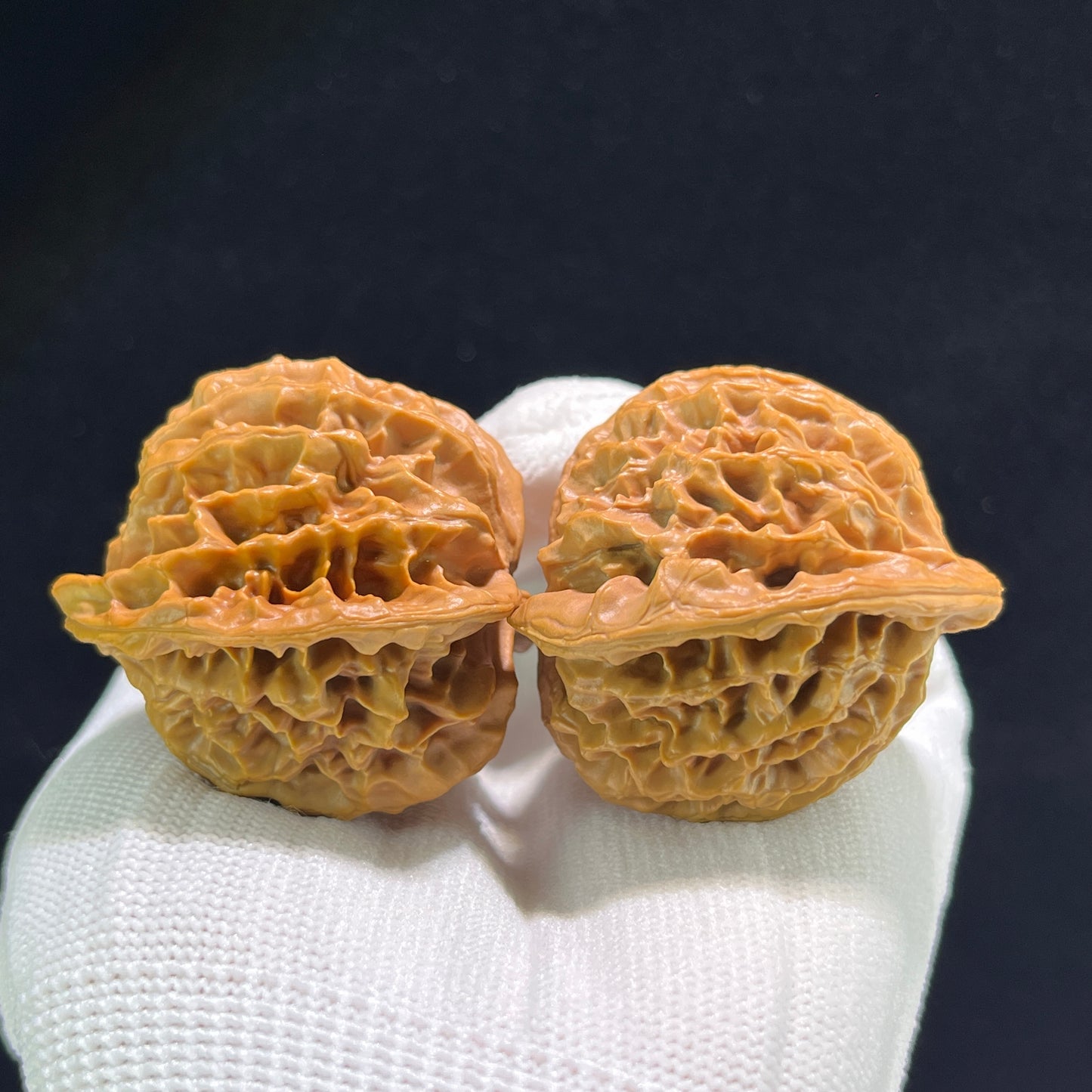 Pair of Walnut Palace Lantern hand exercisers from ThePatinaProject, featuring 42mm x 40mm dimensions and intricate carved details.