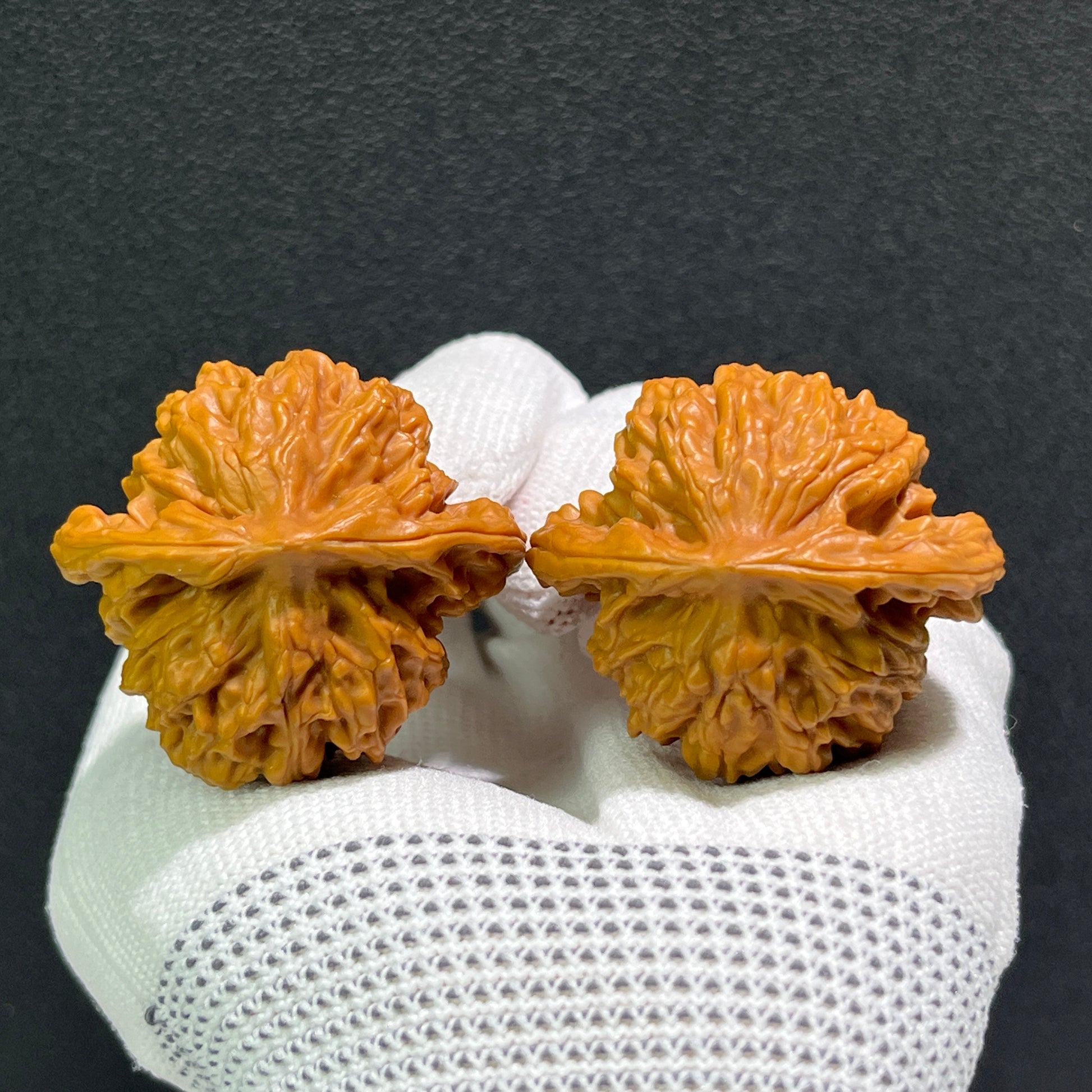 Pair of Peach Heart Walnut Hand Exercisers by ThePatinaProject, 40mm x 36mm, featuring natural walnut wood with carved heart design.