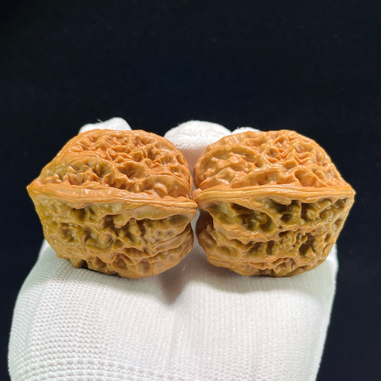Walnut hand exerciser pair, Phoenix Terrace design, 41mm diameter, balanced 1:1 weight, by ThePatinaProject.