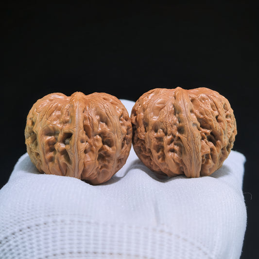 Pair of Walnut Hand Exercisers featuring the Pinggu "Ingot" design, 39mm x 42mm, by ThePatinaProject.