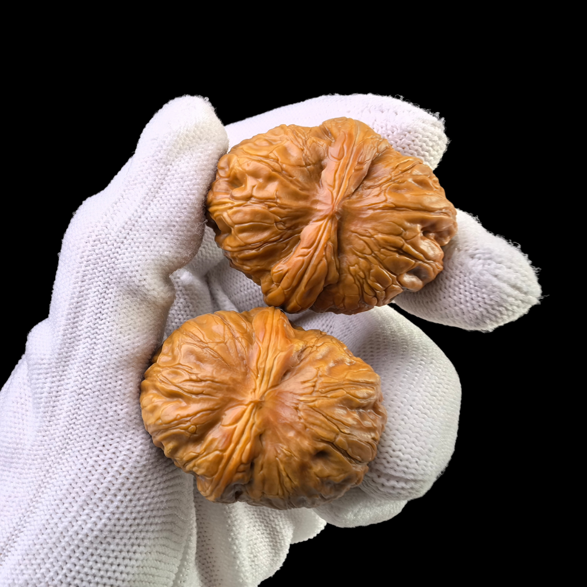 Pair of Pinggu Yuanbao gold ingot walnut hand exercisers from ThePatinaProject, 38mm size, with detailed gold ingot design.