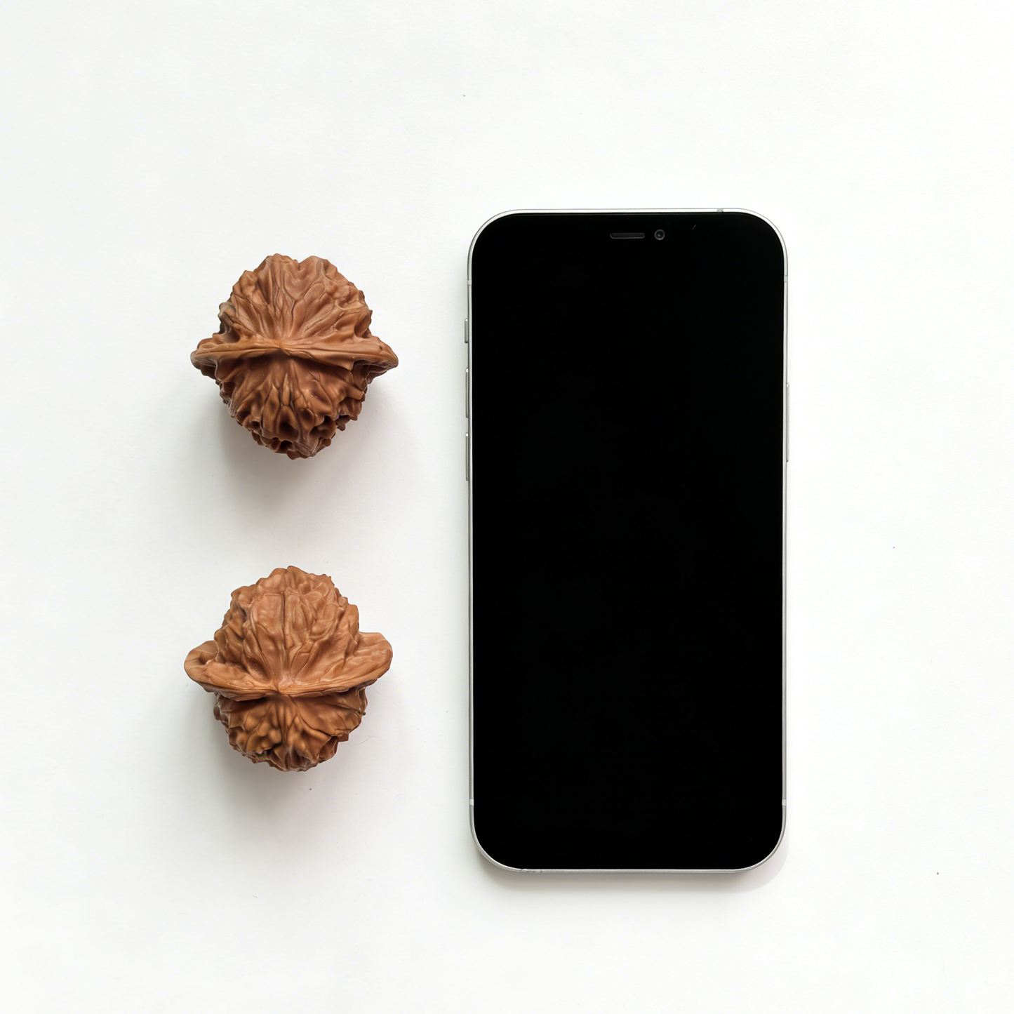 Pair of Walnut Hand Exercisers with micro-grain texture, featuring porcelain doll design, 35mm size, from ThePatinaProject collector’s set