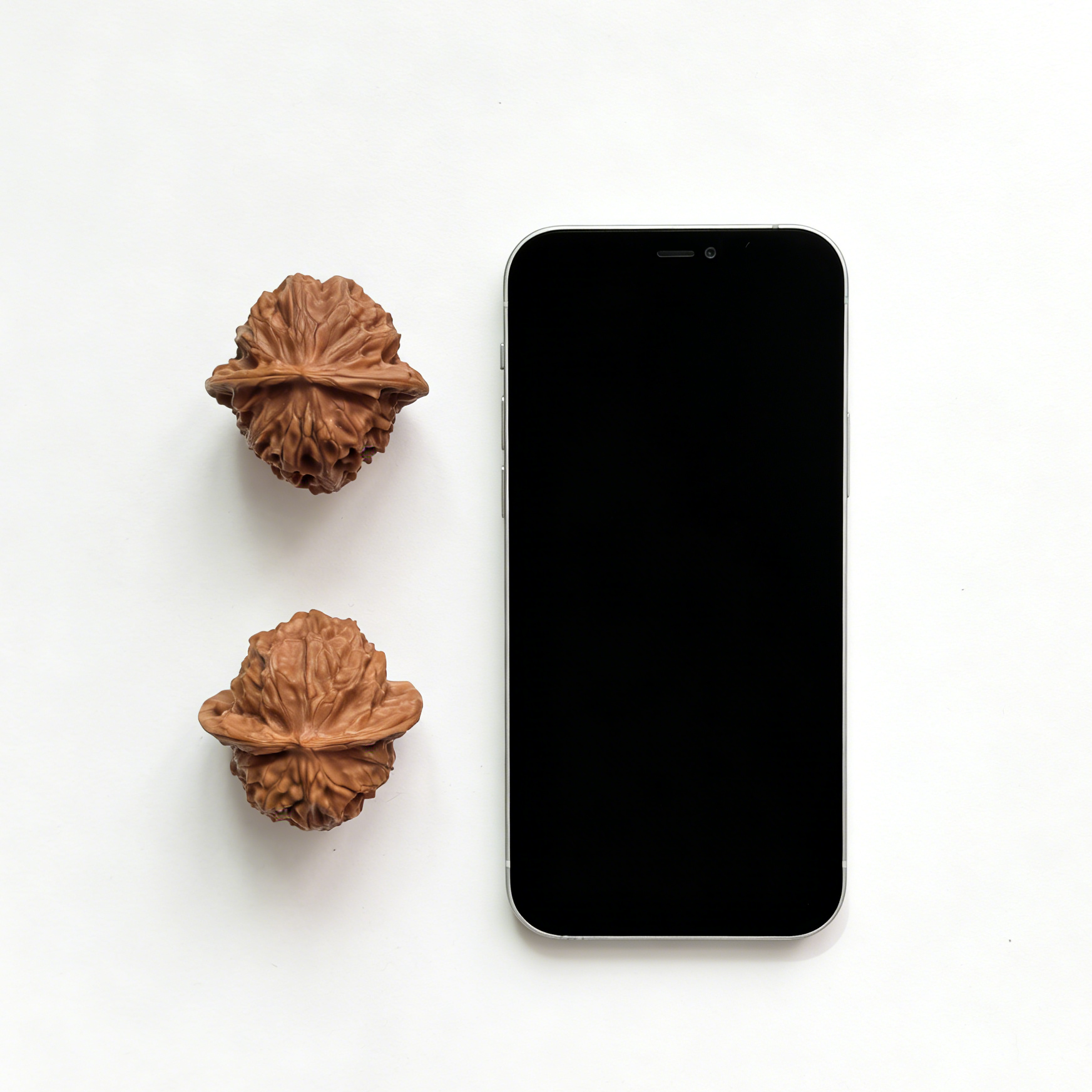 Pair of Walnut Hand Exercisers with micro-grain texture, featuring porcelain doll design, 35mm size, from ThePatinaProject collector’s set