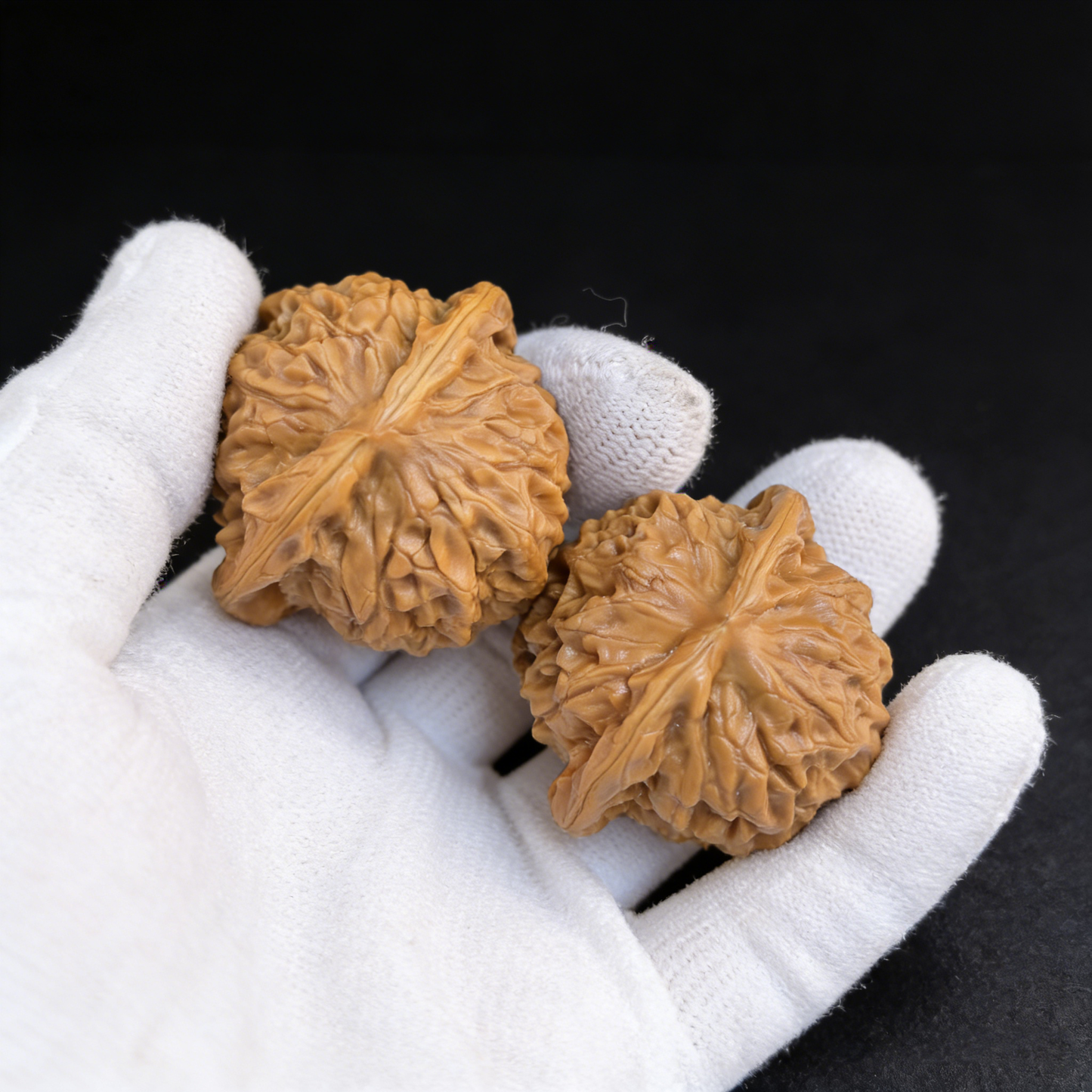 Pair of Walnut Hand Exercisers featuring porcelain doll design, collector's grade, museum quality, by ThePatinaProject.