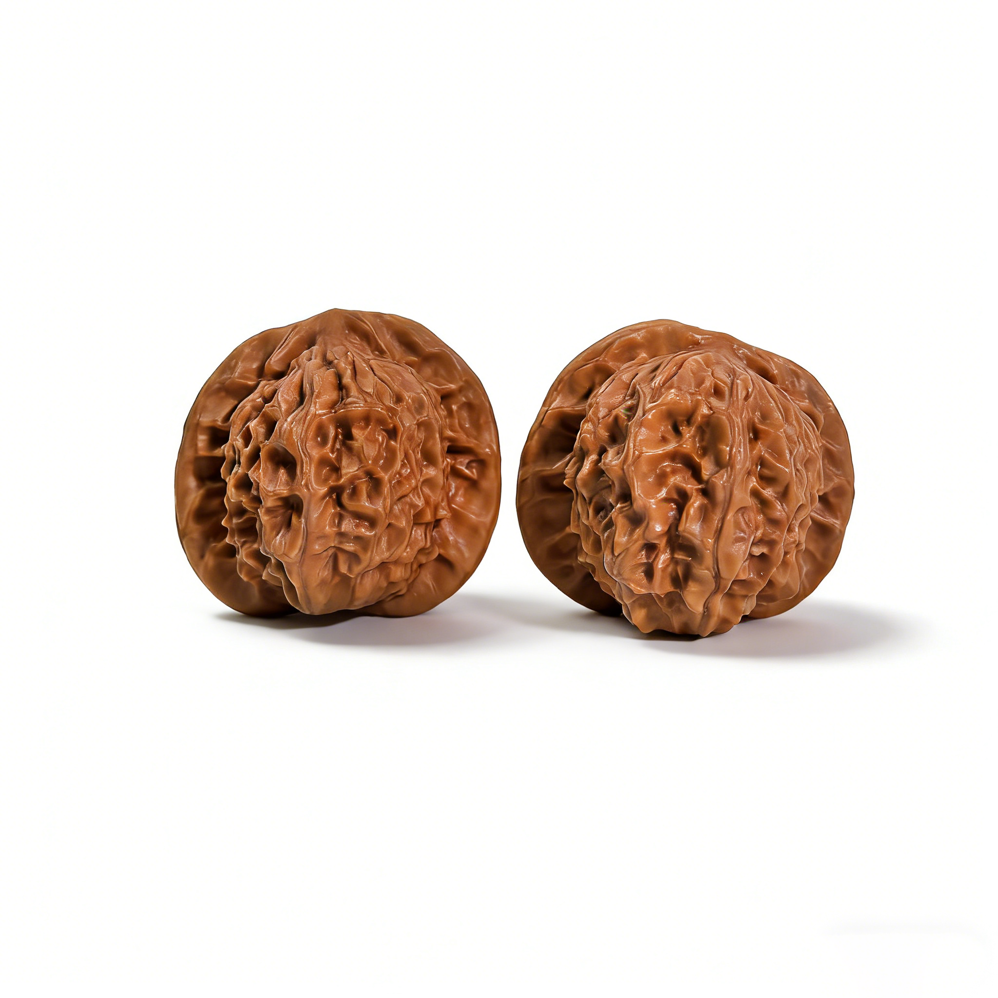 Walnut hand exerciser from ThePatinaProject featuring porcelain doll design with waxy luster, 38mm collector’s pair for refined elegance