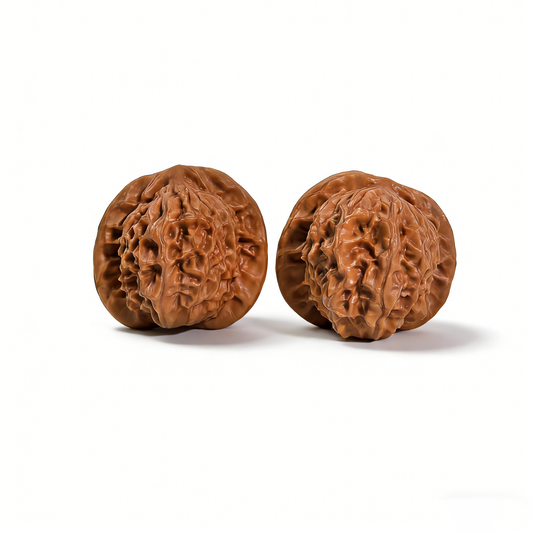 Walnut hand exerciser from ThePatinaProject featuring porcelain doll design with waxy luster, 38mm collector’s pair for refined elegance