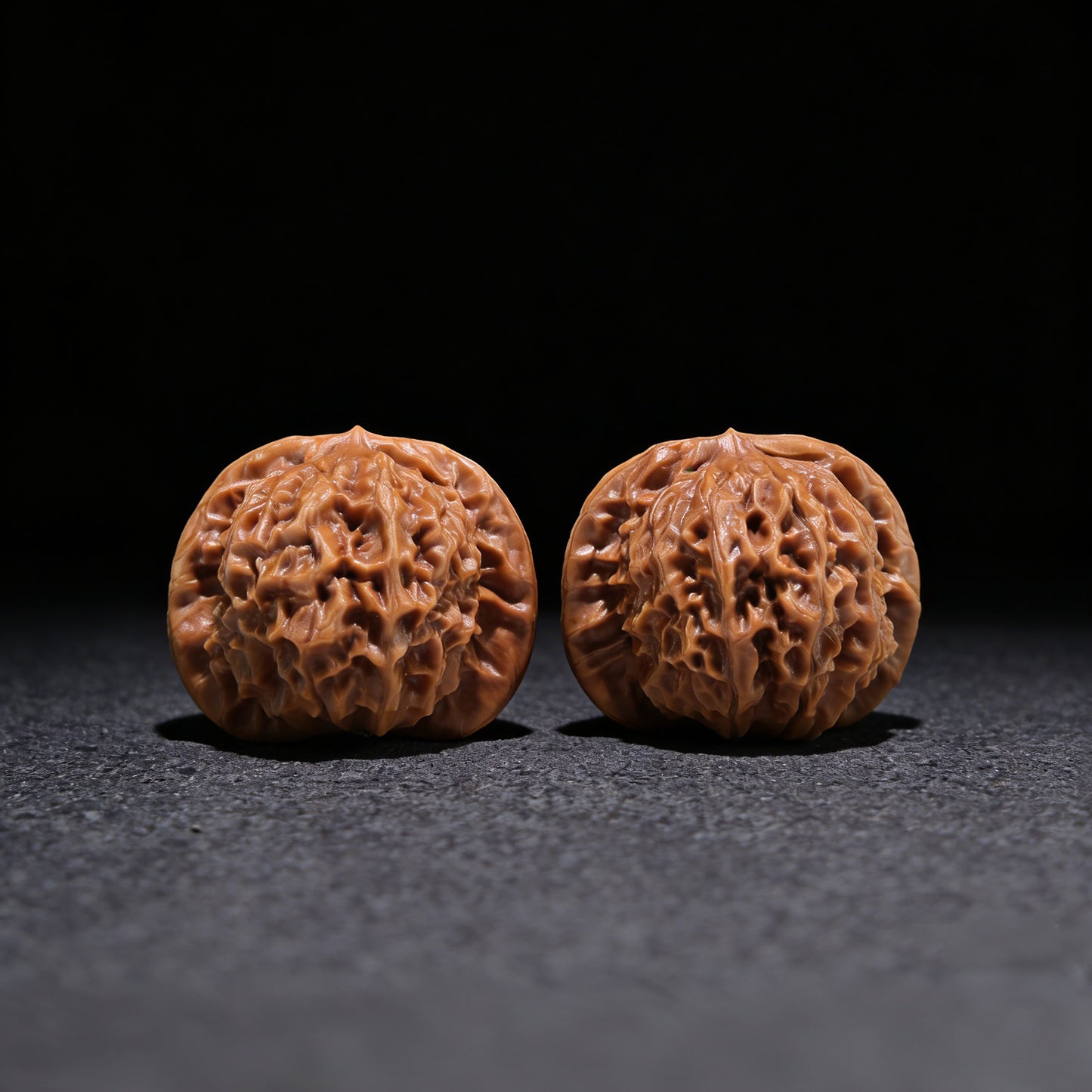 Pair of Walnut Hand Exercisers with porcelain doll official seal, boutique grade, 41mm x 37mm, by ThePatinaProject.