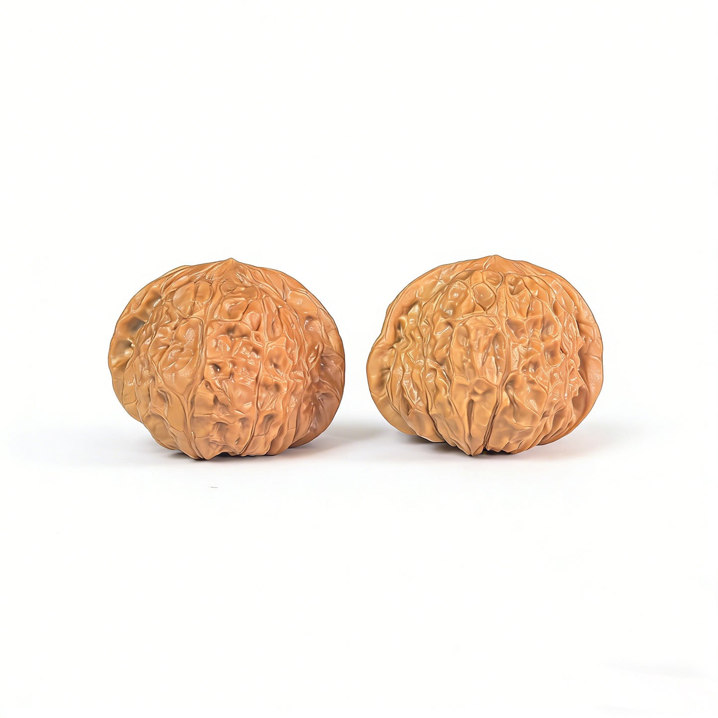 Pair of Walnut Hand Exercisers called Pumpkin Block (Nan Gua Dun) by ThePatinaProject, 42mm x 44mm, showing the textured wooden surface.