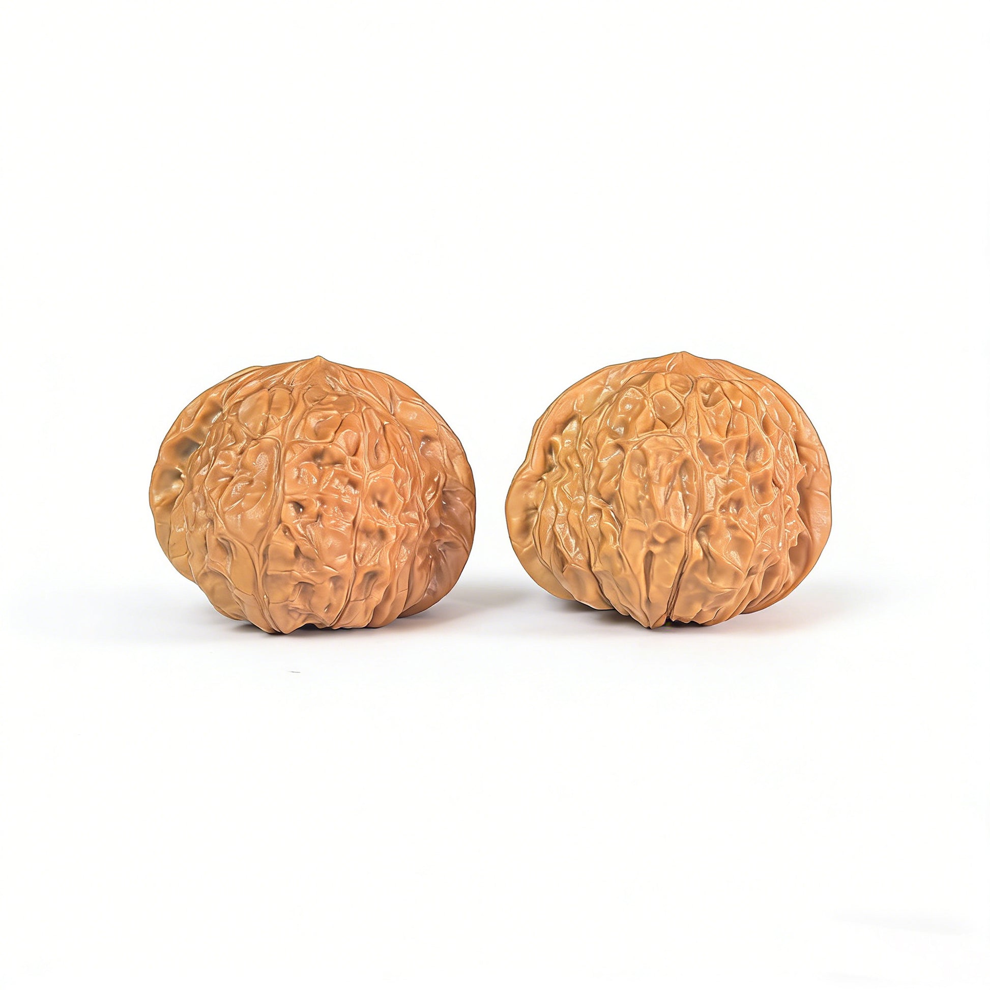 Pair of Walnut Hand Exercisers called Pumpkin Block (Nan Gua Dun) by ThePatinaProject, 42mm x 44mm, showing the textured wooden surface.