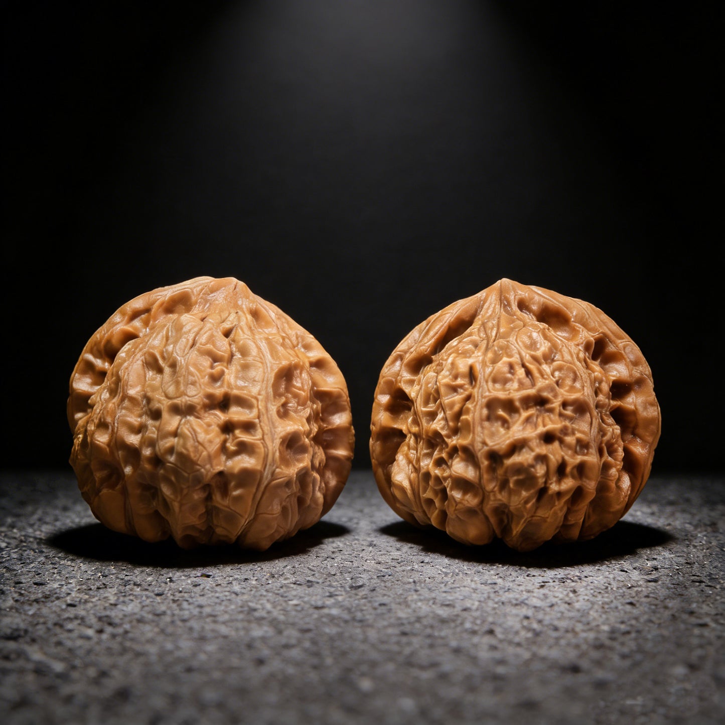 Walnut hand exerciser pair called Pumpkin Block from ThePatinaProject, 45mm x 40mm, showing textured wooden blocks for grip and exercise.