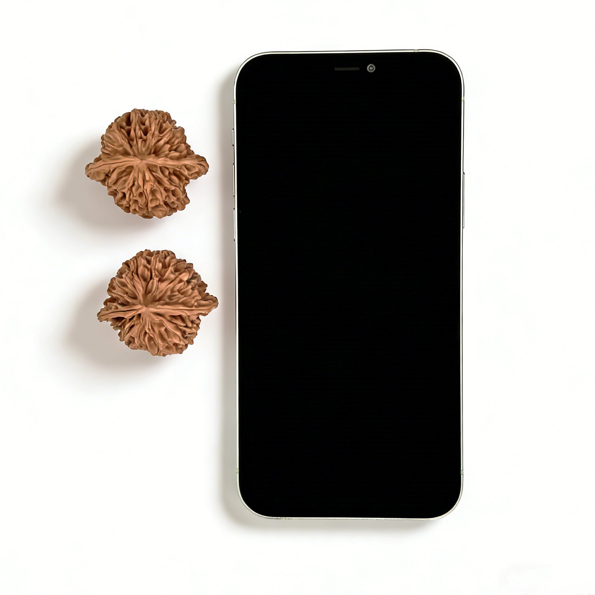 Walnut hand exercisers pair, "Qi Bu Gou" model, 38mm x 37mm, from ThePatinaProject, showing textured walnut wood grips.