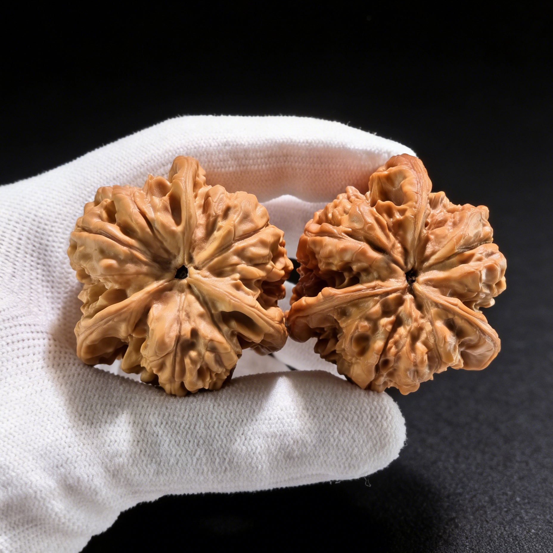 Walnut hand exercisers from ThePatinaProject, triangle collector's pair with 38mm x 38mm x 49mm dimensions, DGMSN-02E.