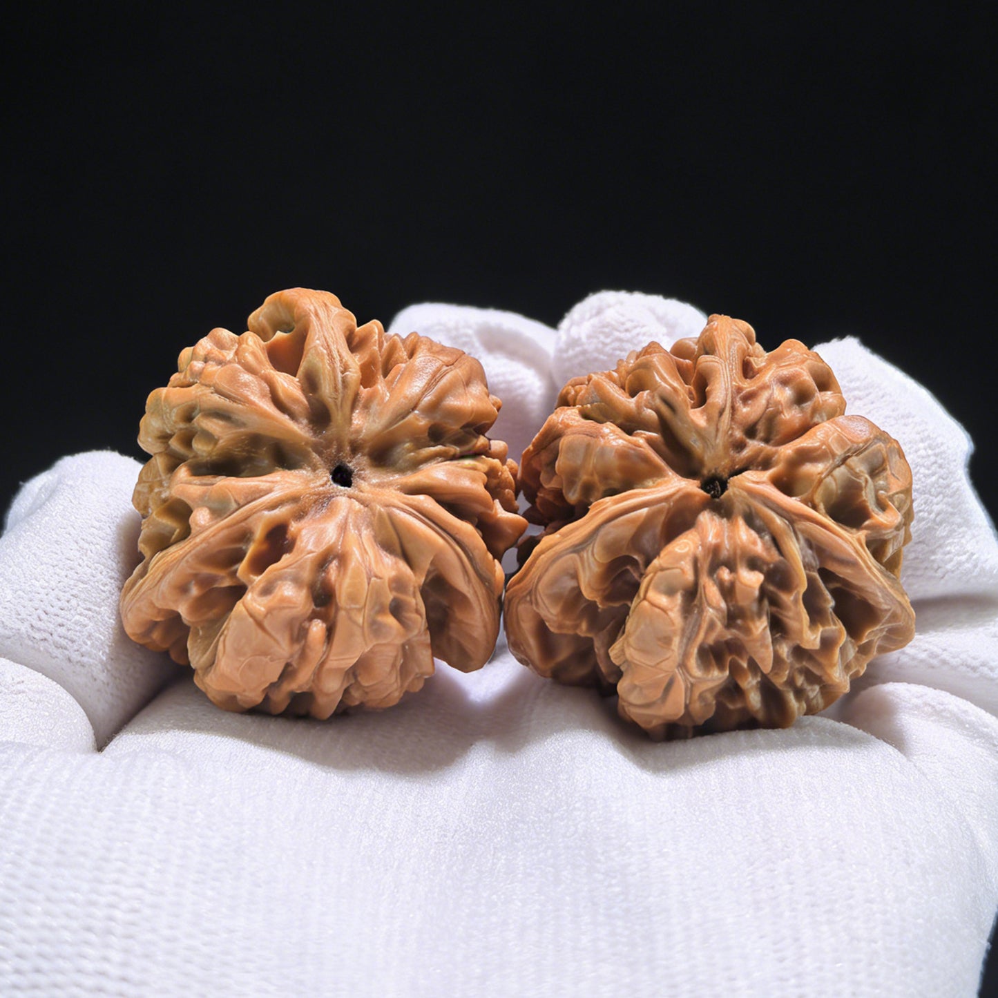 Walnut hand exerciser from ThePatinaProject's San Leng Crown collection, 38x33x45mm, featuring intricate wood grain and handcrafted details.
