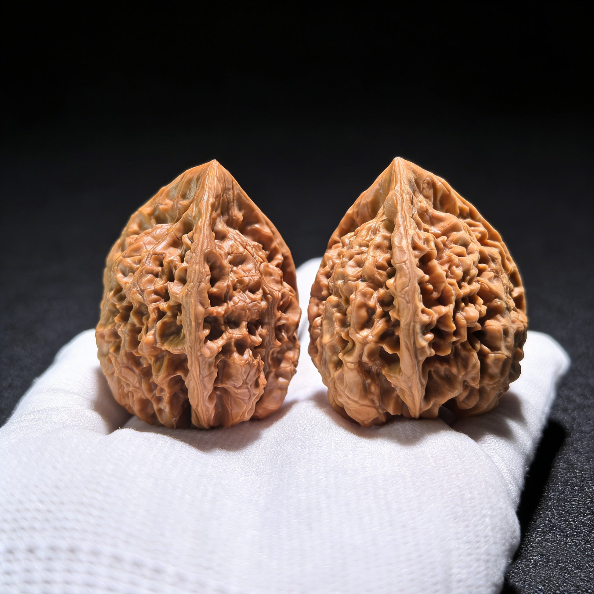 Walnut hand exerciser from ThePatinaProject's San Leng Crown collection, 38x33x45mm, with detailed carved crown design.