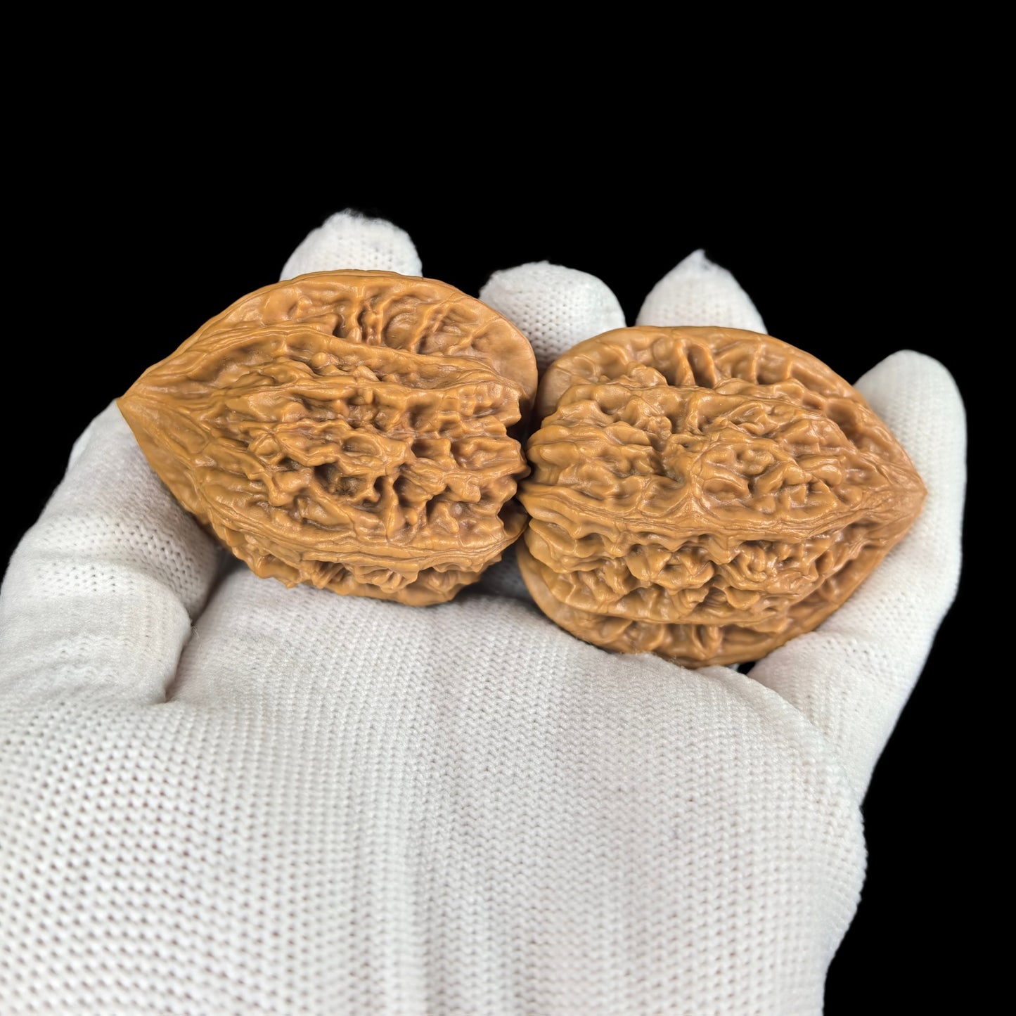 Pair of Walnut Hand Exercisers from ThePatinaProject, 35mm size, featuring smooth wooden finish and ergonomic design.
