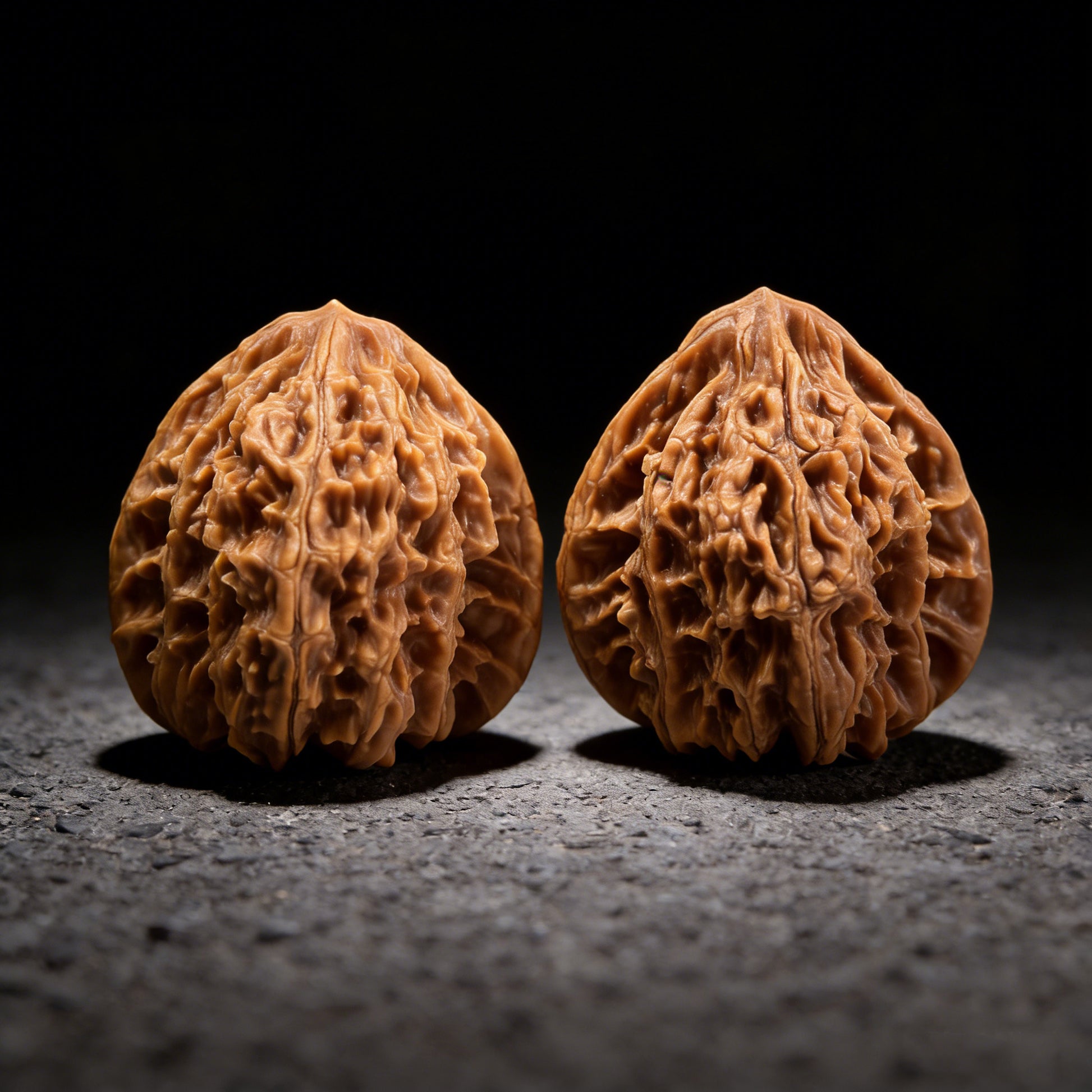 Pair of Small Beijing Chicken Heart Walnut Hand Exercisers from ThePatinaProject, 35mm size, featuring intricate carved walnut designs.
