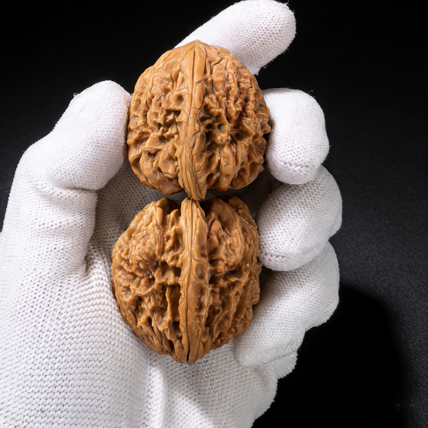 Pair of Walnut hand exercisers with aggressive fractal texture and snowstorm design, 38mm size from ThePatinaProject.