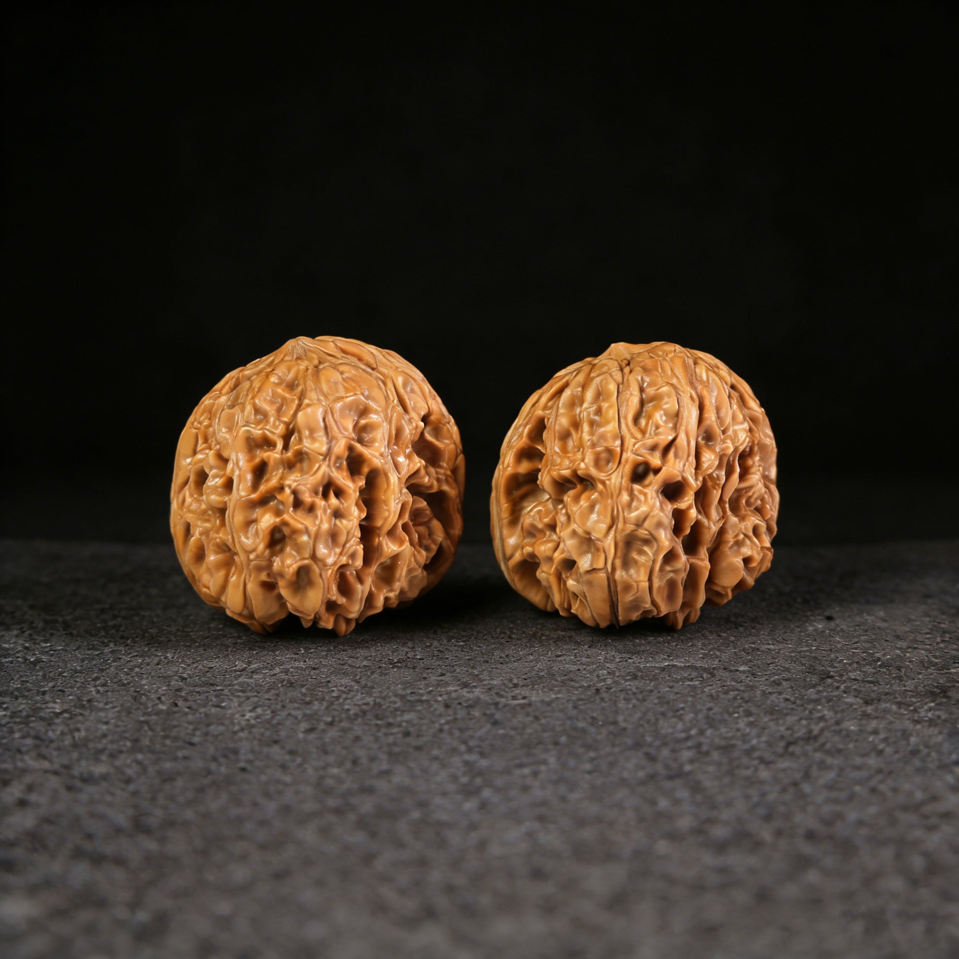 Walnut hand exerciser pair with Stout Cushion from ThePatinaProject, Mendun model, 45mm diameter, MD-101 for grip strength training.