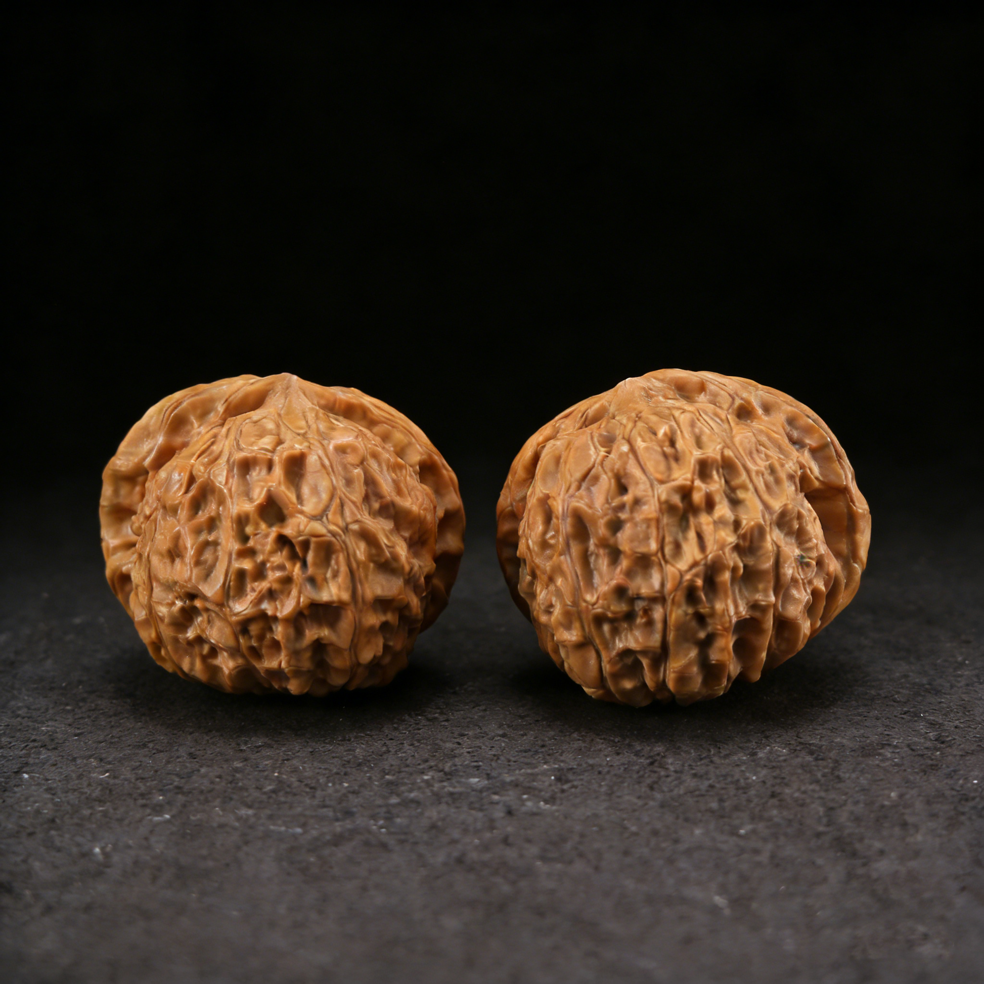Walnut hand exerciser called the Stout Guardian Men Dun by ThePatinaProject, featuring a 48mm heavyweight design.