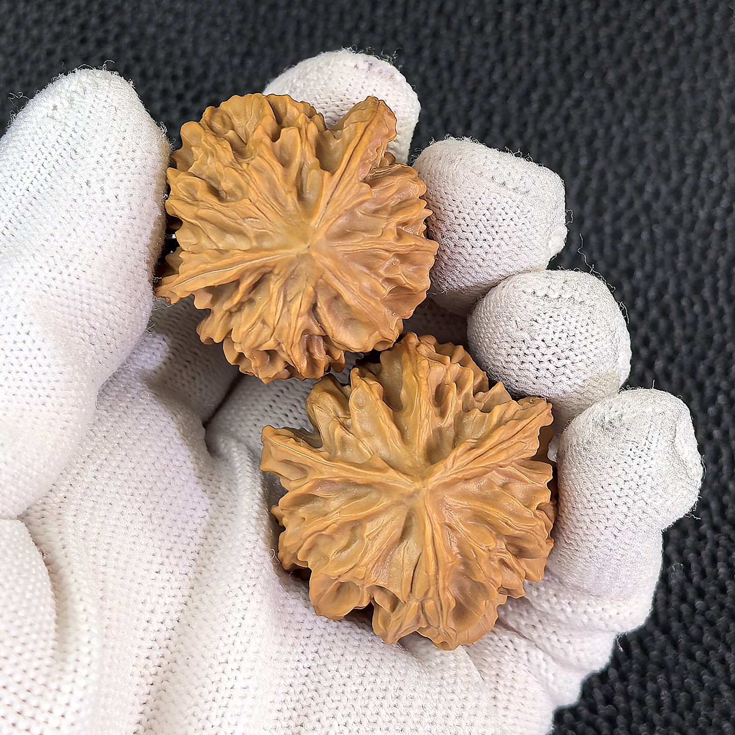 Pair of Walnut Hand Exercisers, Three-Ridge Ben (San Leng Ben), 33mm x 32mm, SNB-301 from ThePatinaProject, showing textured grip.