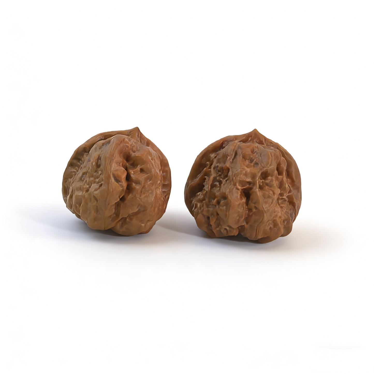 Walnut hand exerciser featuring the "Toad Head" design by ThePatinaProject, classic low-profile Zen architecture collector’s pair.