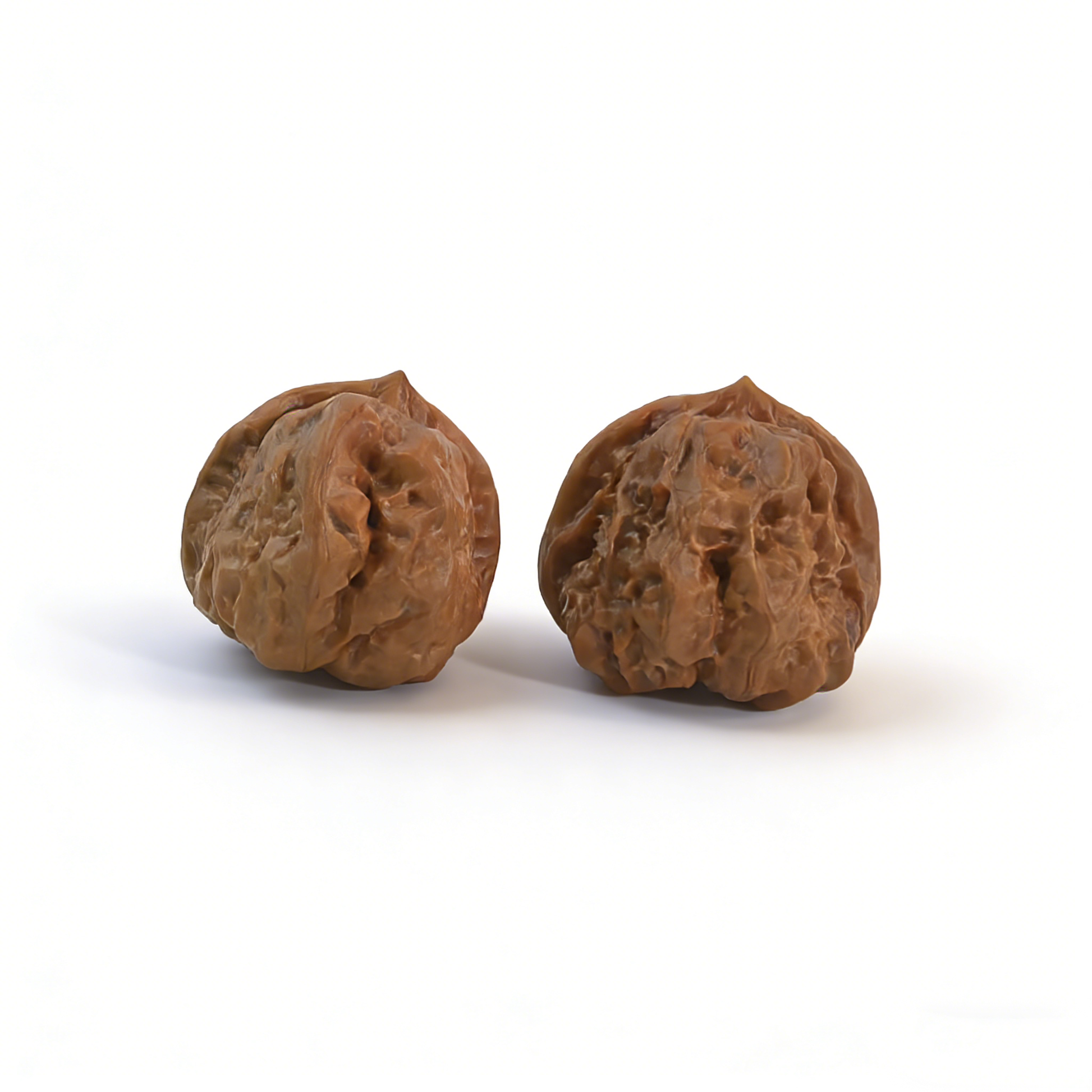Walnut hand exerciser featuring the "Toad Head" design by ThePatinaProject, classic low-profile Zen architecture collector’s pair.