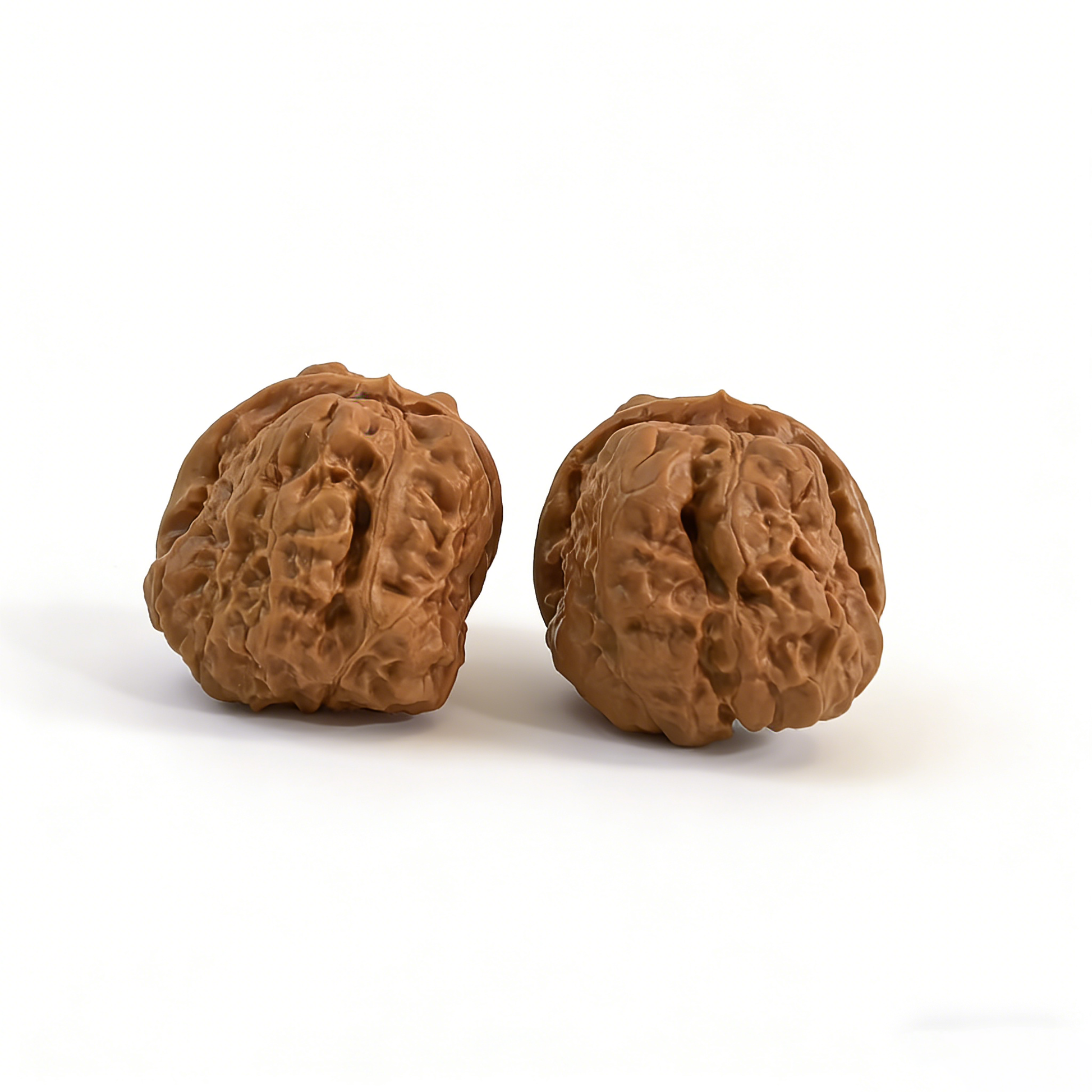 Pair of Walnut hand exercisers labeled "Toad Head" with textured skin from ThePatinaProject, 35mm collector’s size, natural wood finish.
