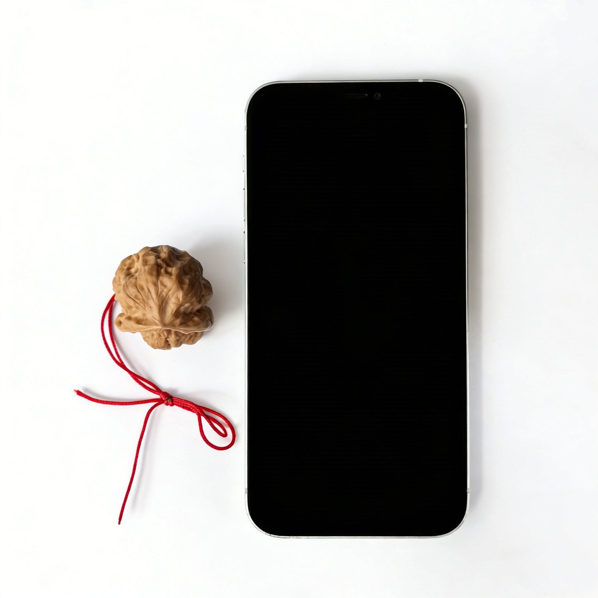 Walnut hand exerciser pendant featuring a natural sculptural toad head design, handcrafted by ThePatinaProject, 32mm accessory.